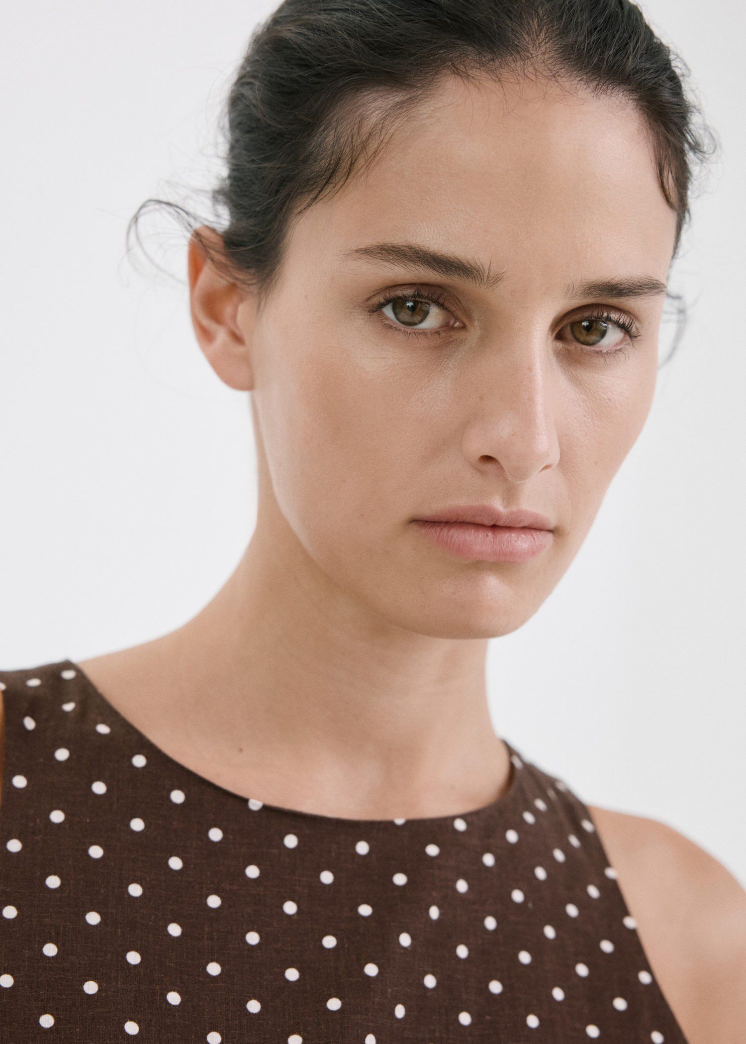 Linen jumpsuit with polka-dot belt