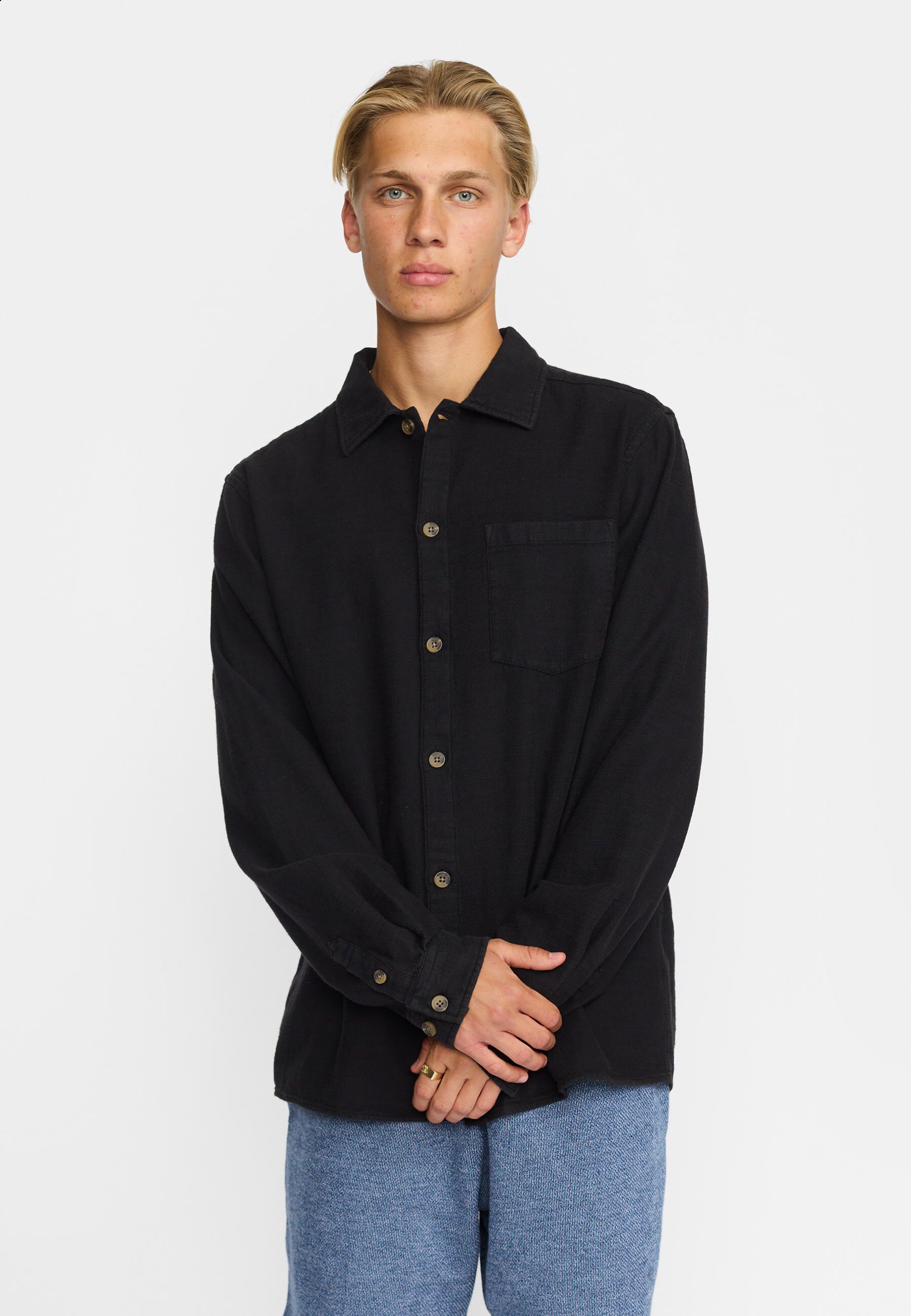 A casual overshirt in a structured garment dyed cotton fabri