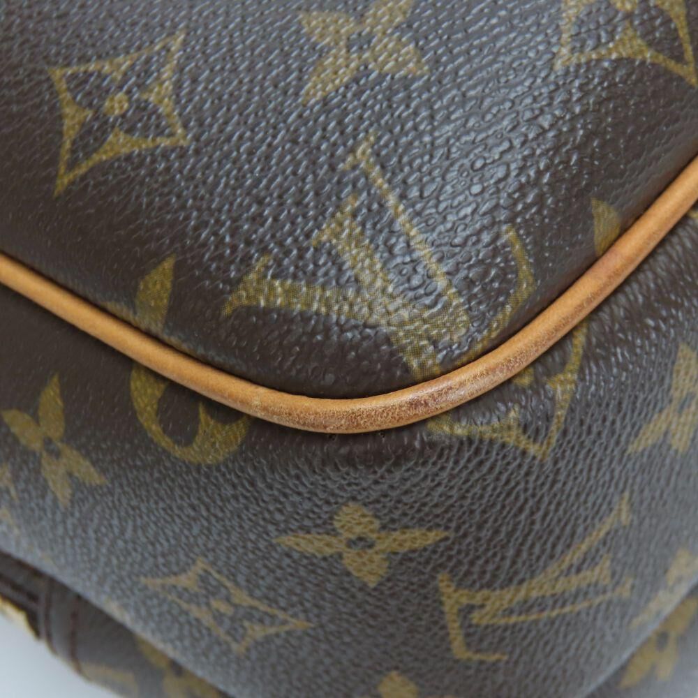 Louis Vuitton Reporter