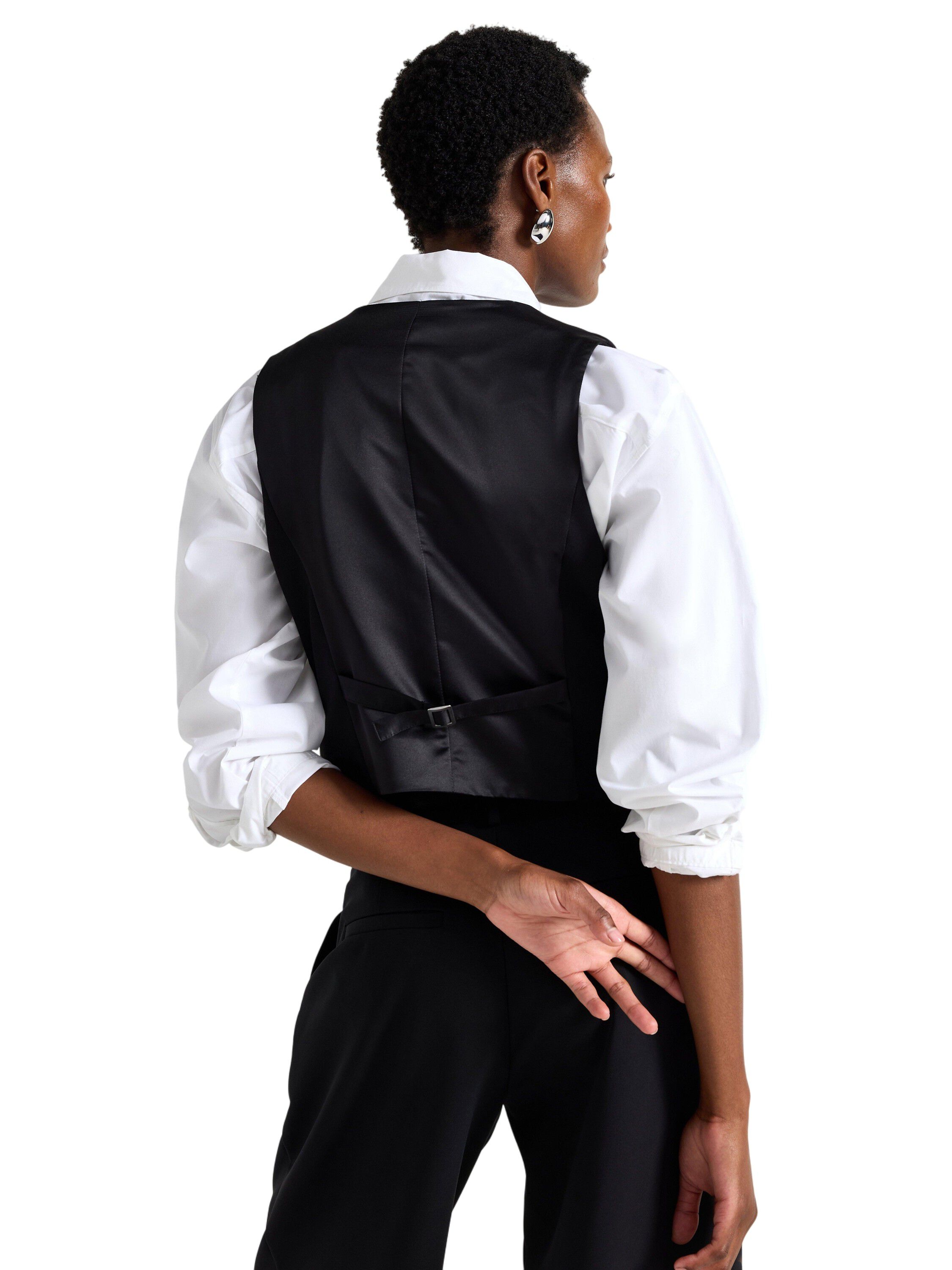 Klassisk vest med knaplukning foran