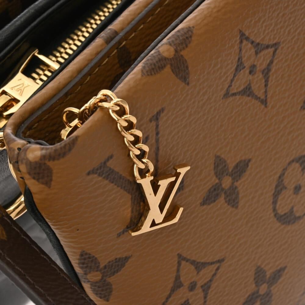 Louis Vuitton Clutch