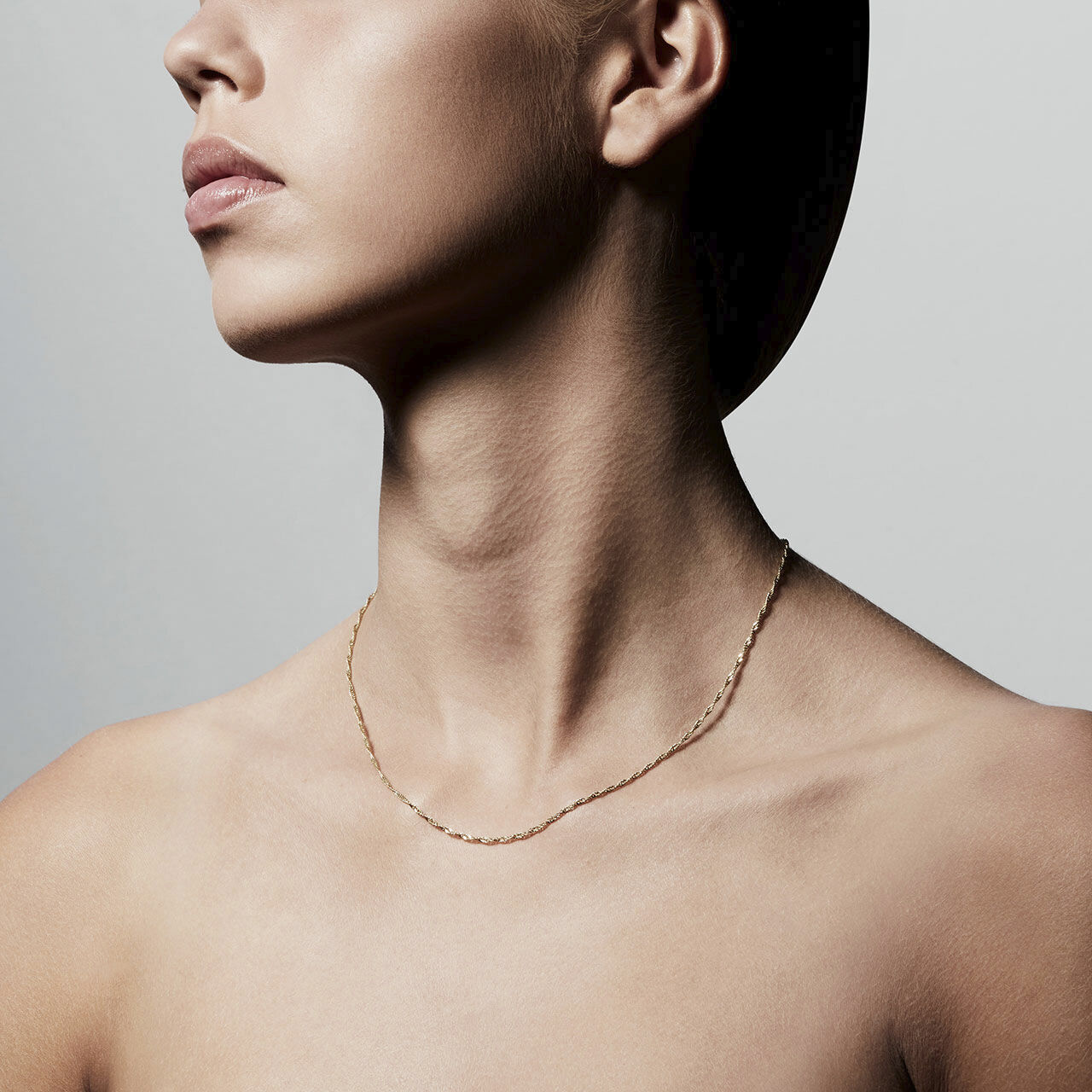 Halsk&aelig;de, Peri, Guldbelagt