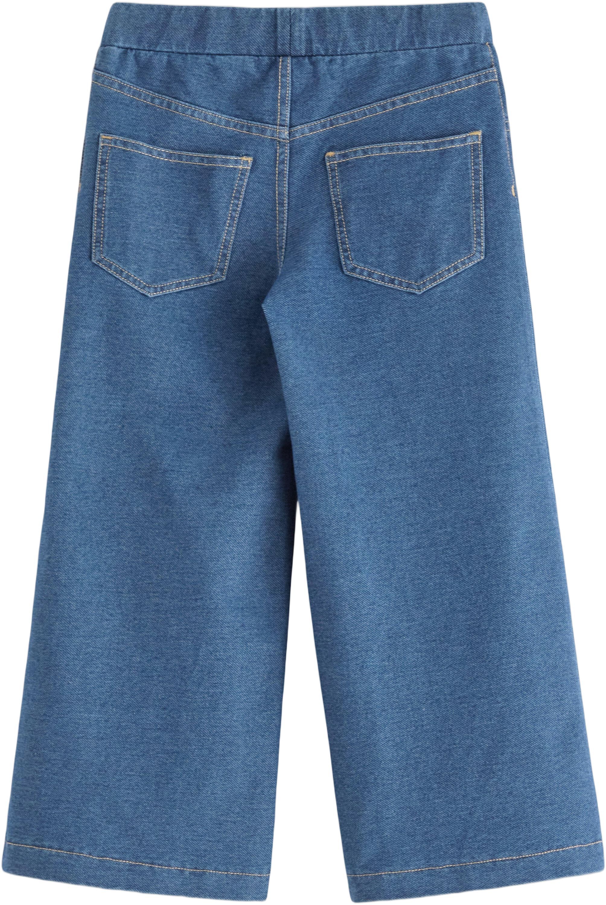 Mjuk byxa i denimtrik&aring; med vida be