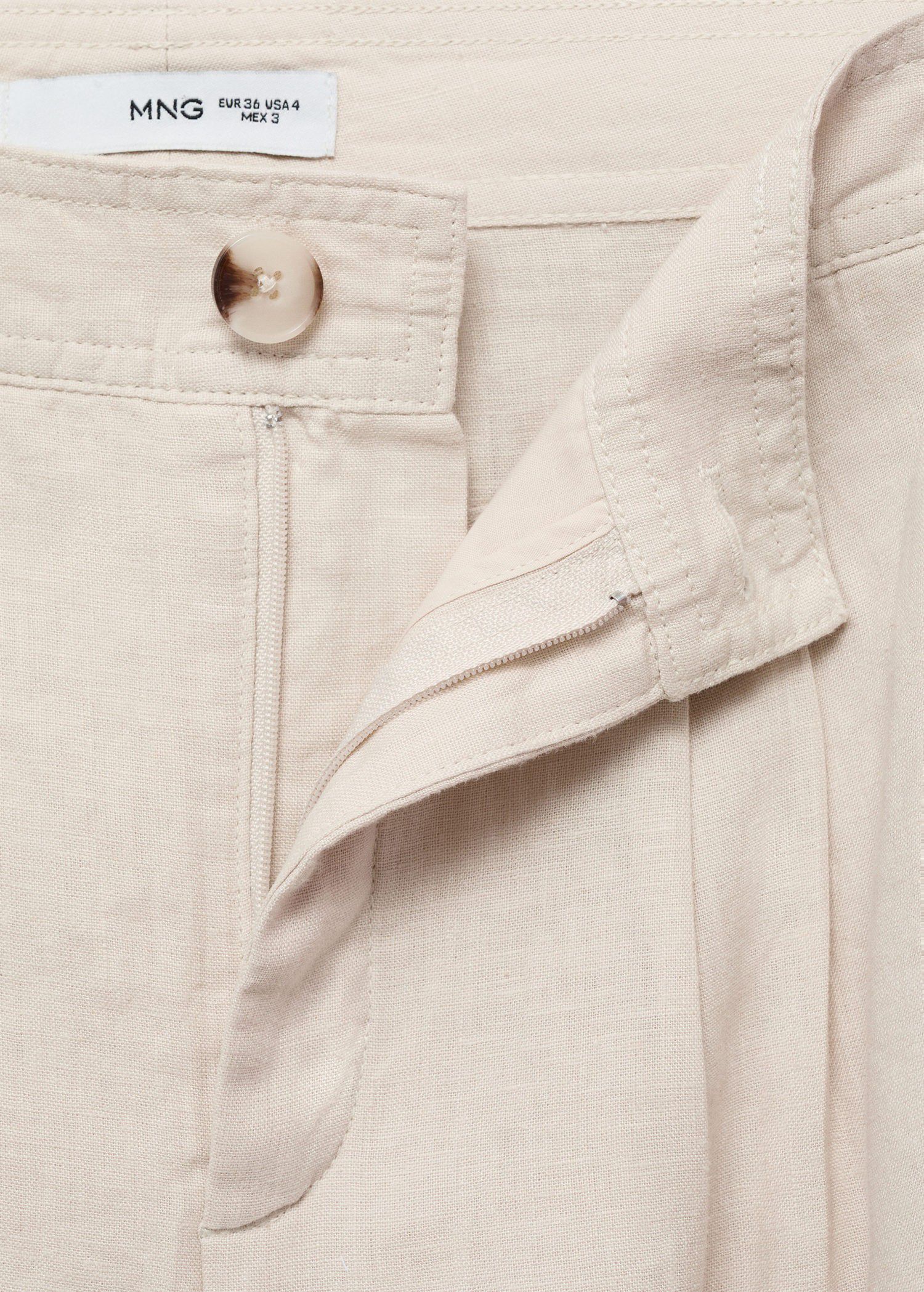 Linen trousers with tortoiseshell b