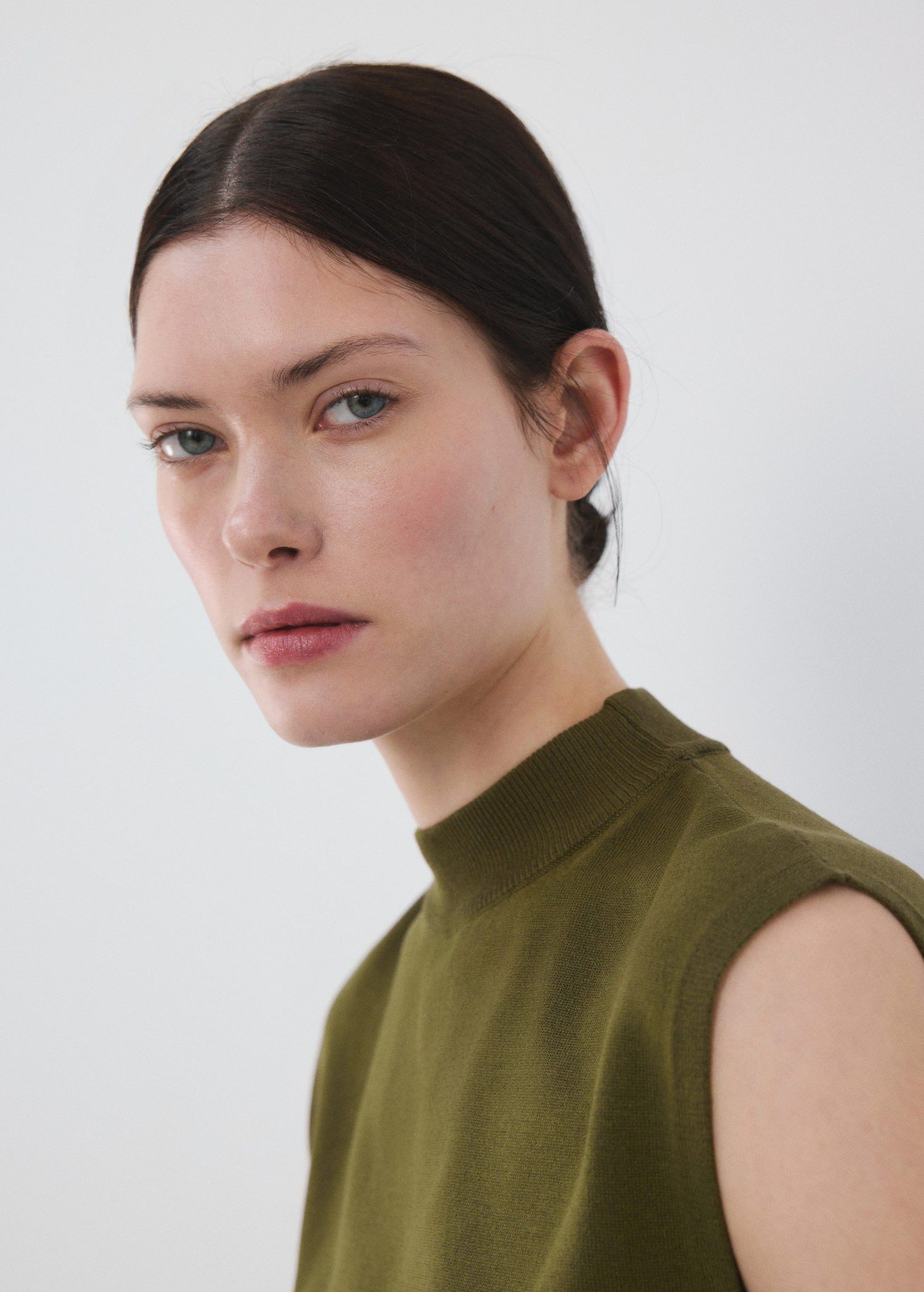 Belted knitted waistcoat