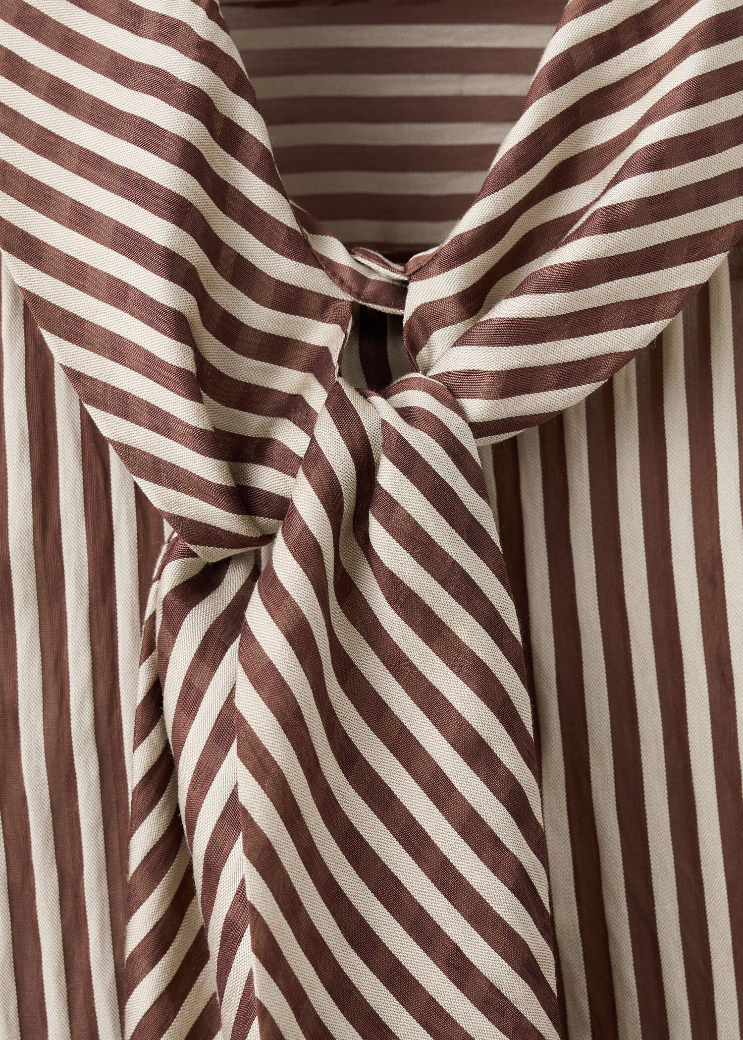 Striped blouse with bow tie neck
