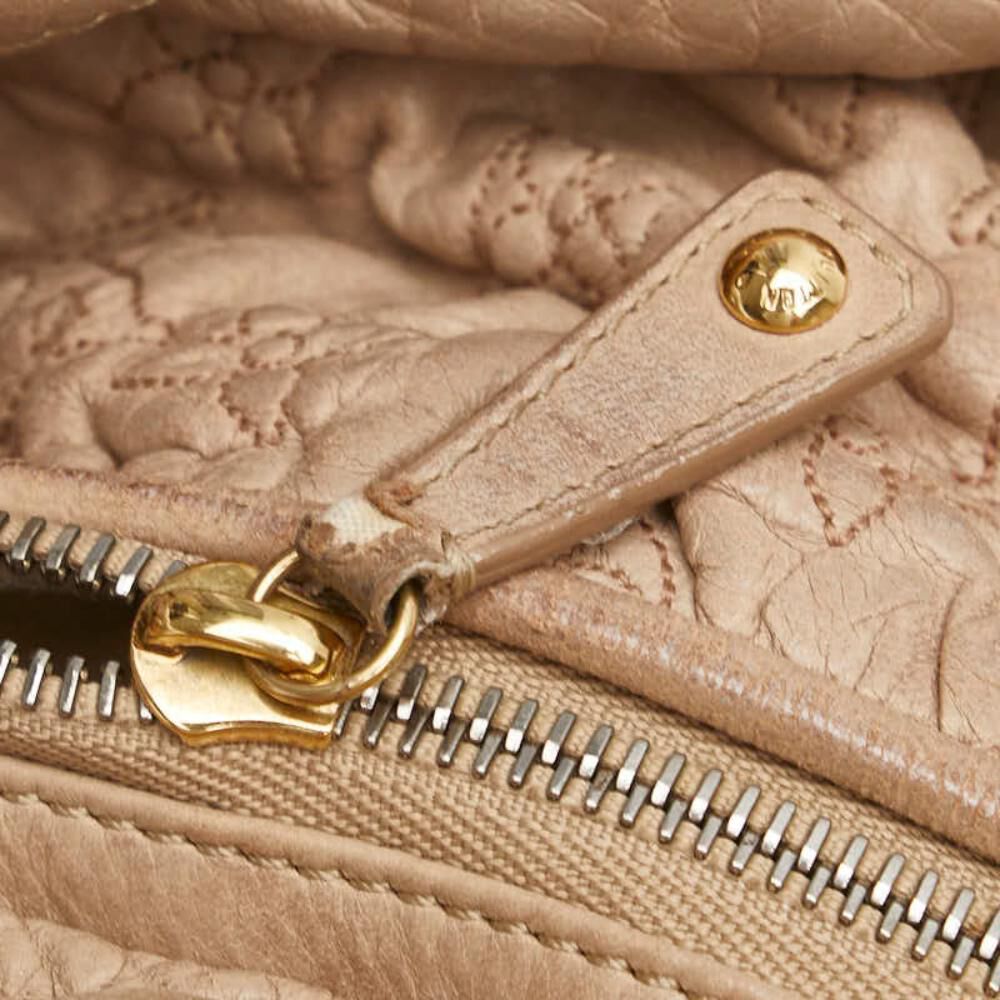 Louis Vuitton Olympe