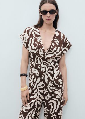 Printed linen jumpsuit with belt