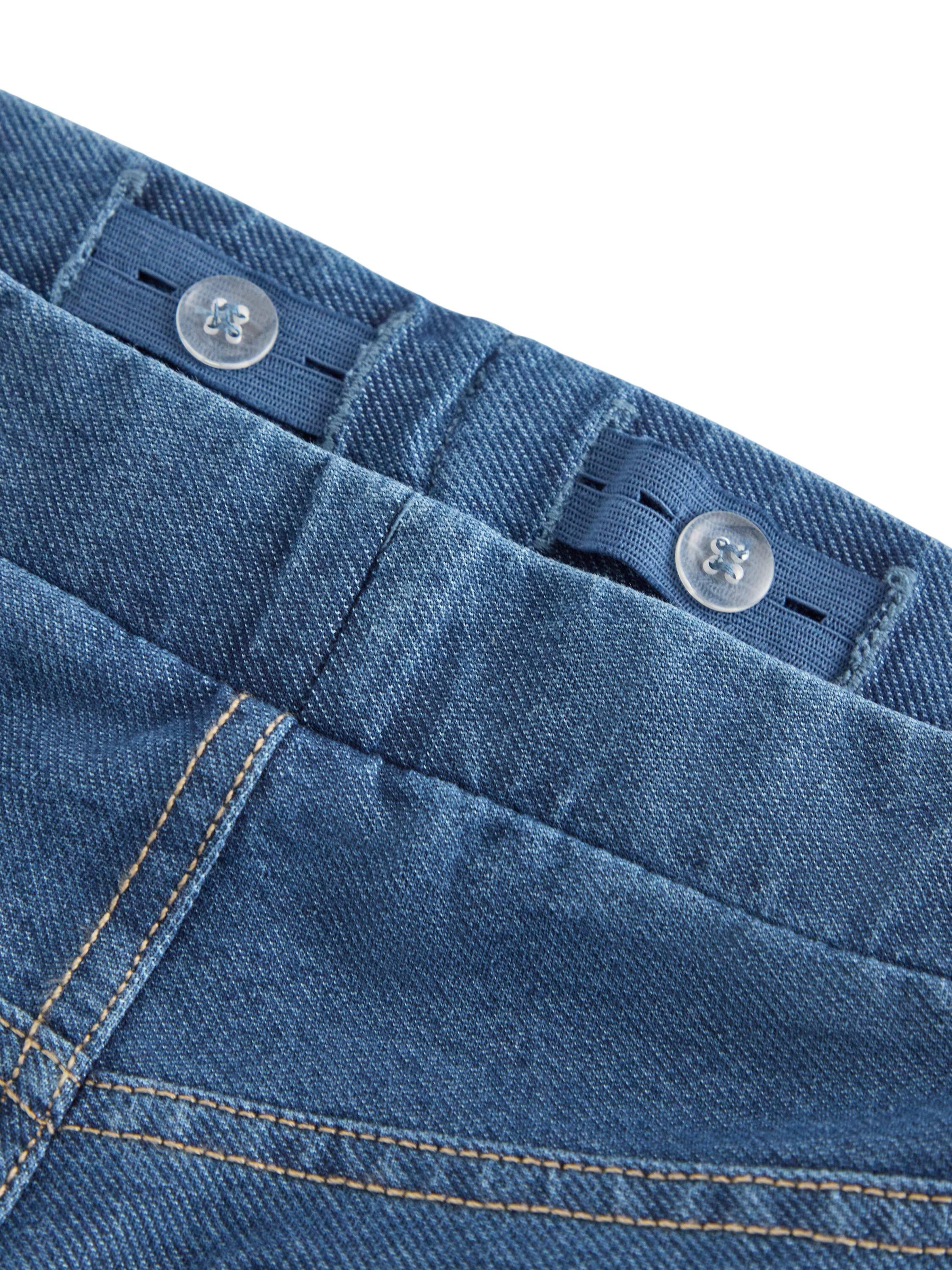 Mjuk byxa i denimtrik&aring; med vida be