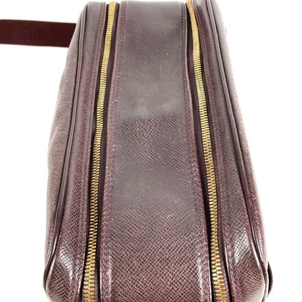 Louis Vuitton Reporter