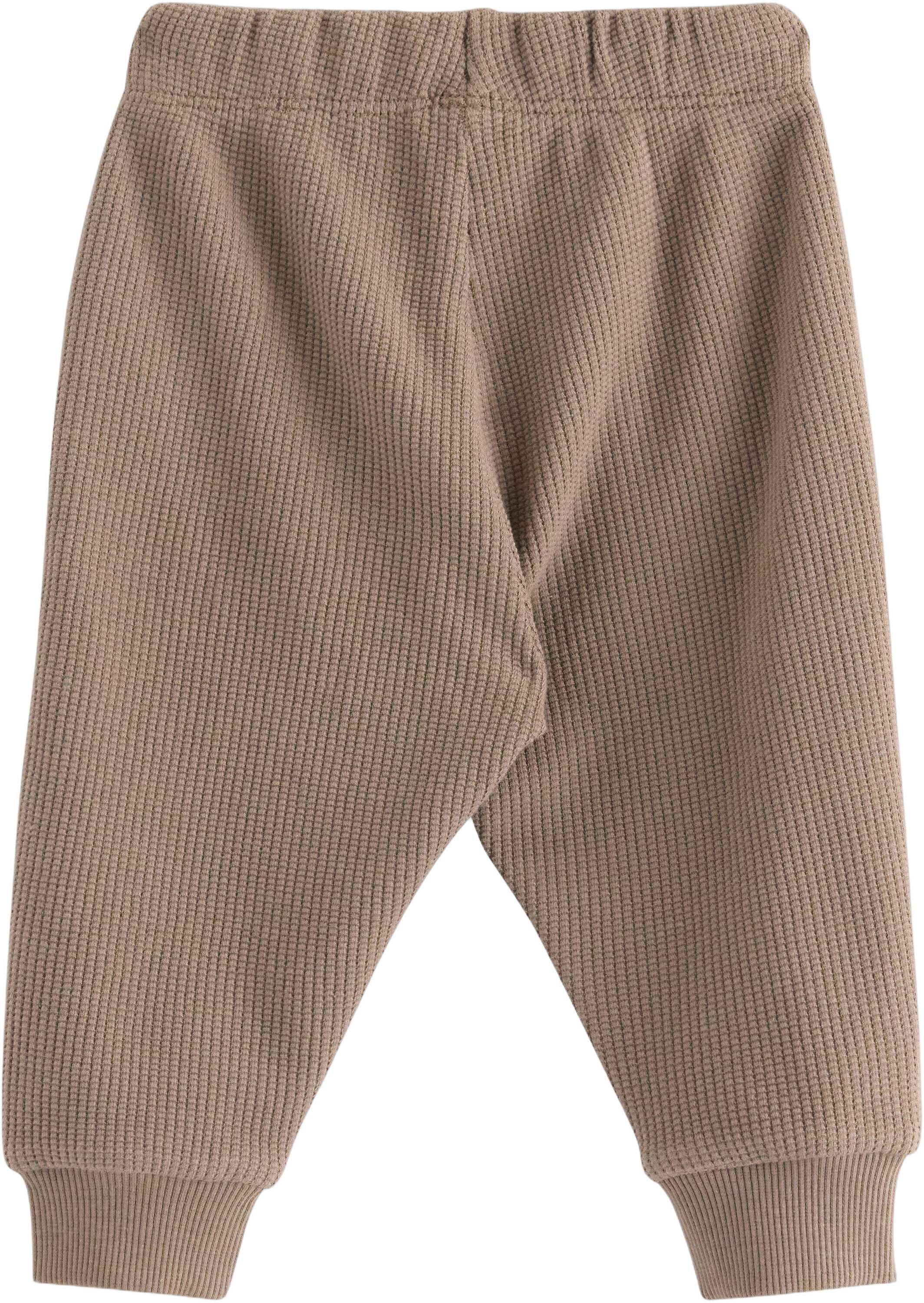 Joggers in waffled cotton with appl