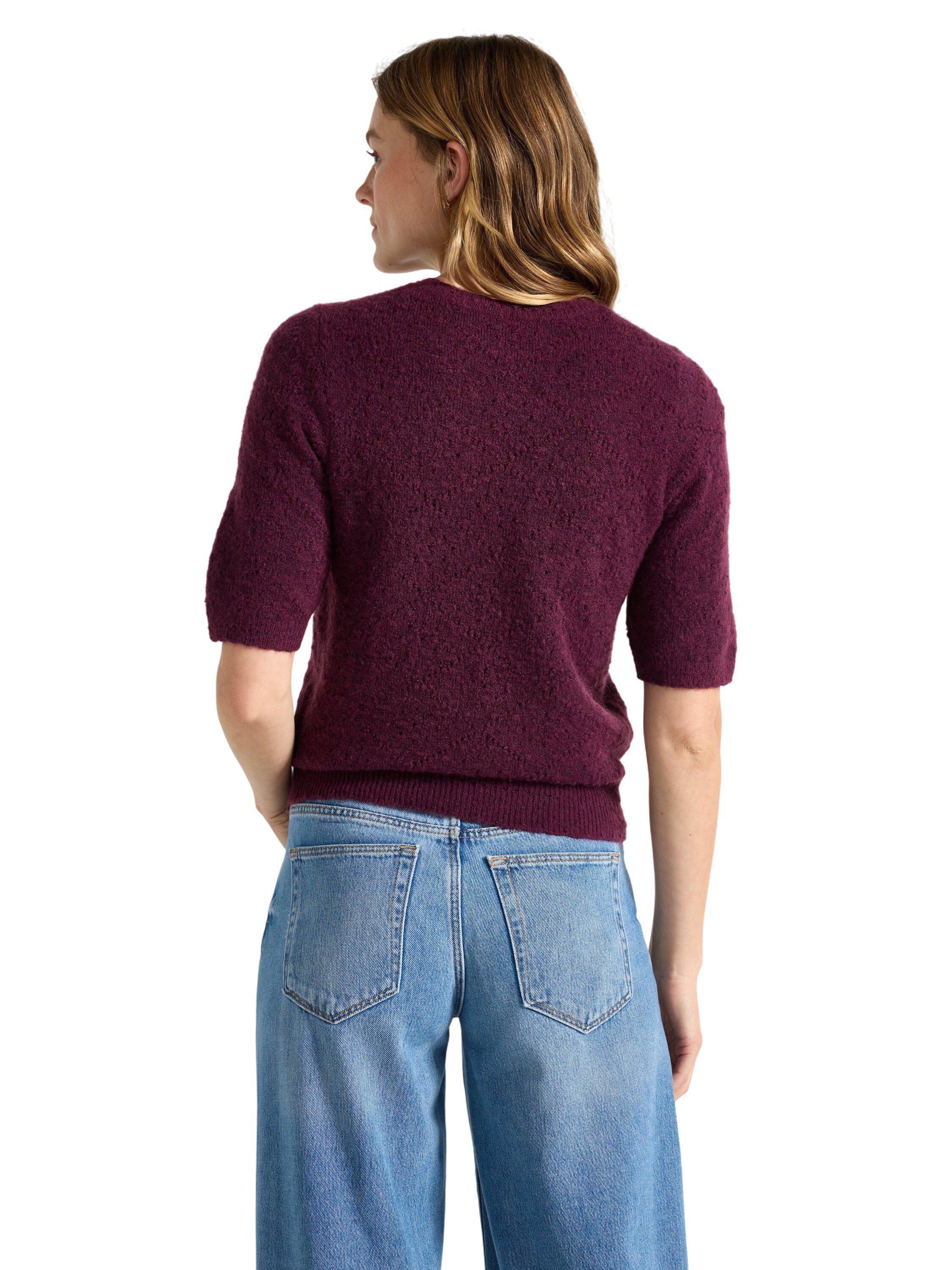 Mjuk, kort&auml;rmad tr&ouml;ja med ett hel