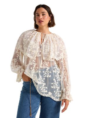 Sleeveless blouse in lace and mesh.