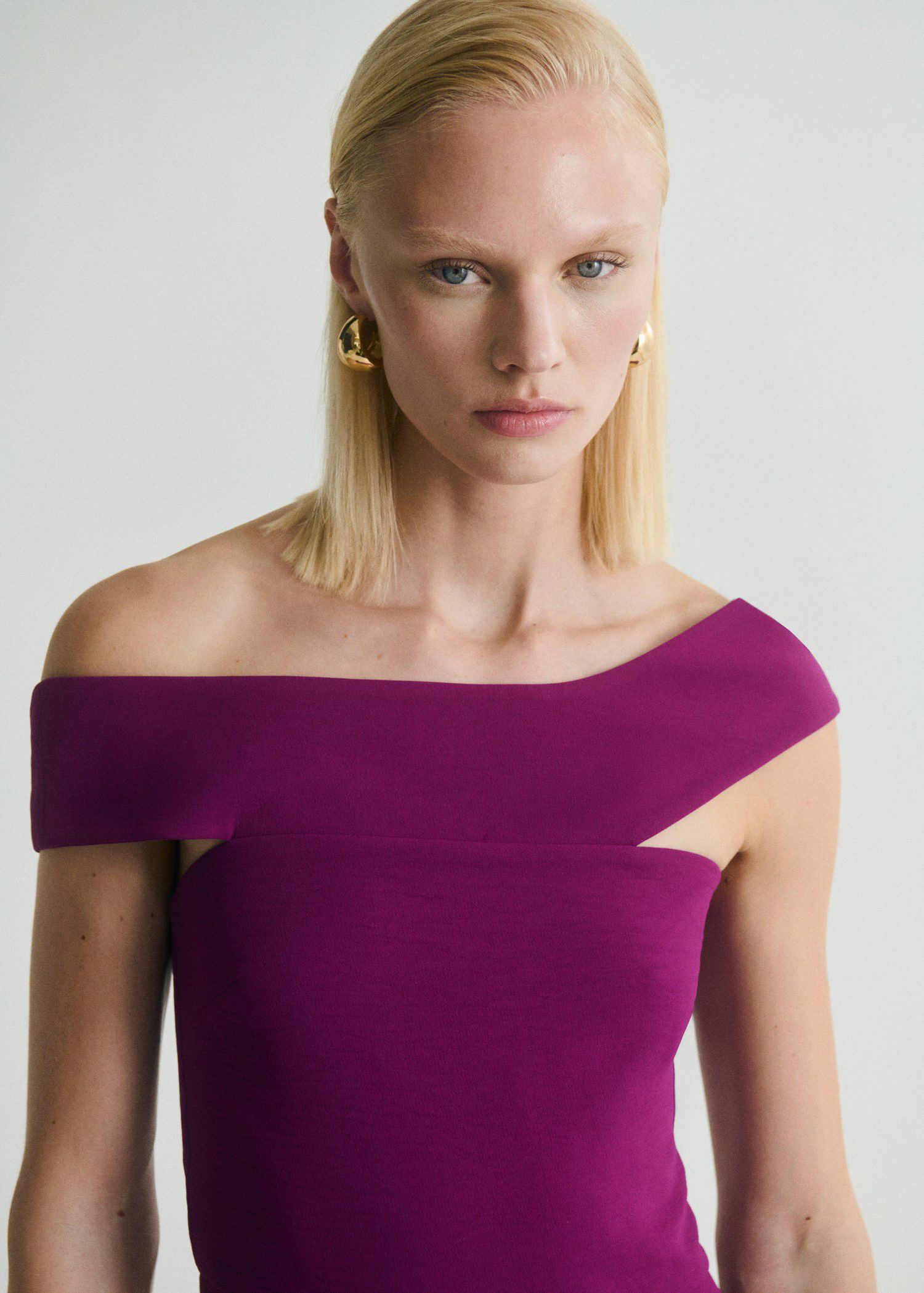 Long jumpsuit with asymmetrical nec