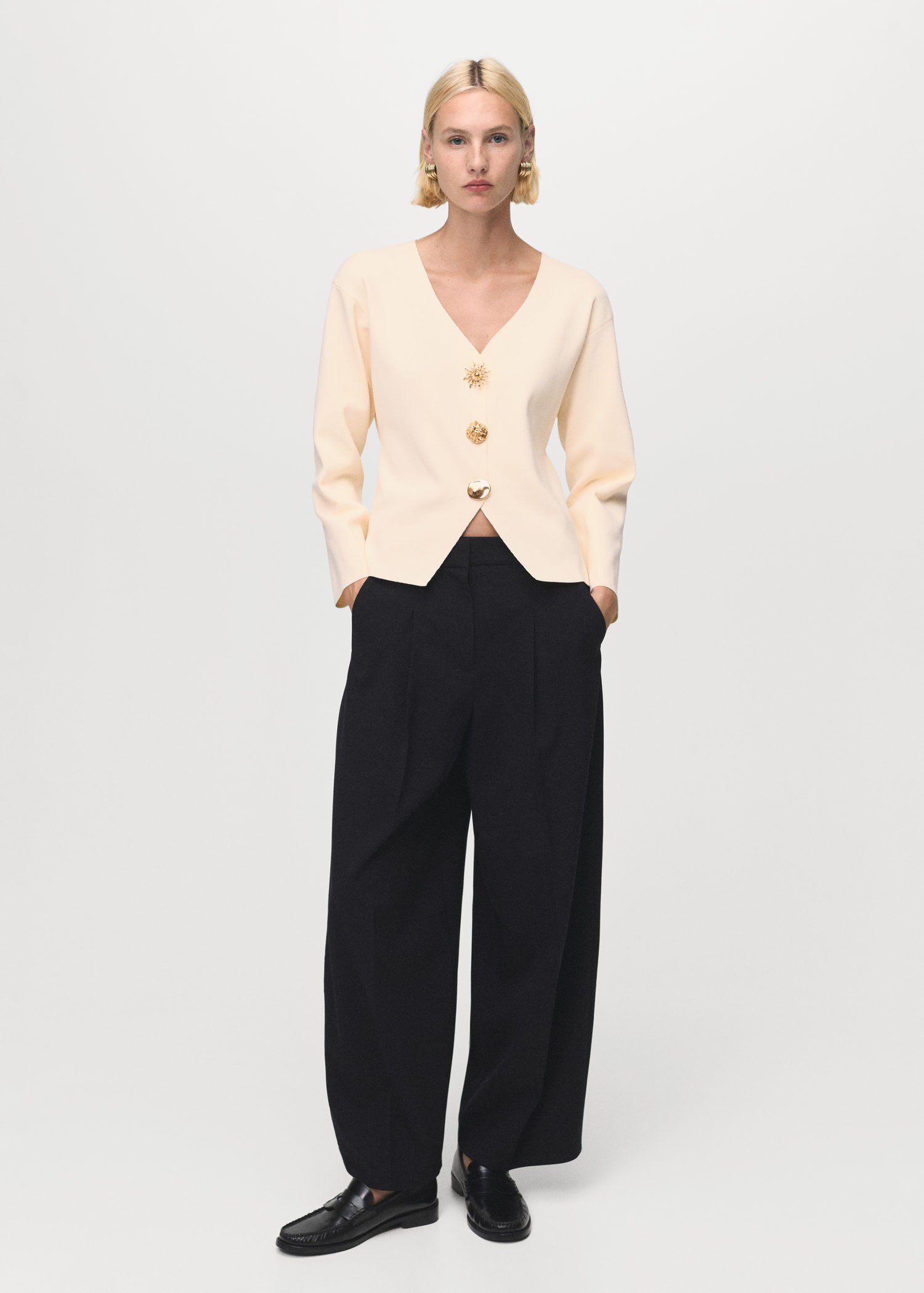 Knitted jacket with jewel buttons