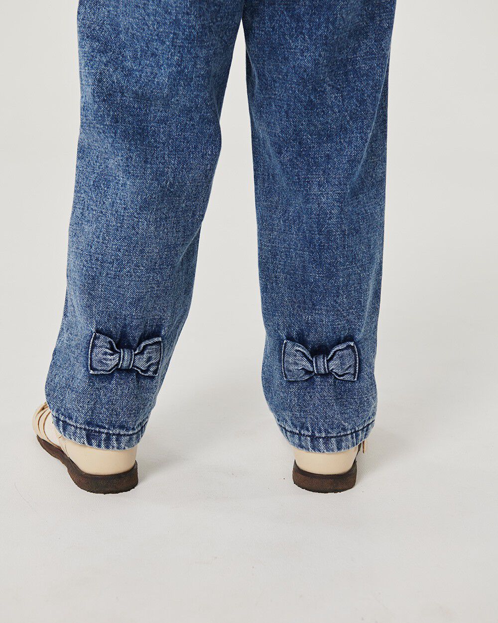 FRILL DENIM PANTS W. BOW