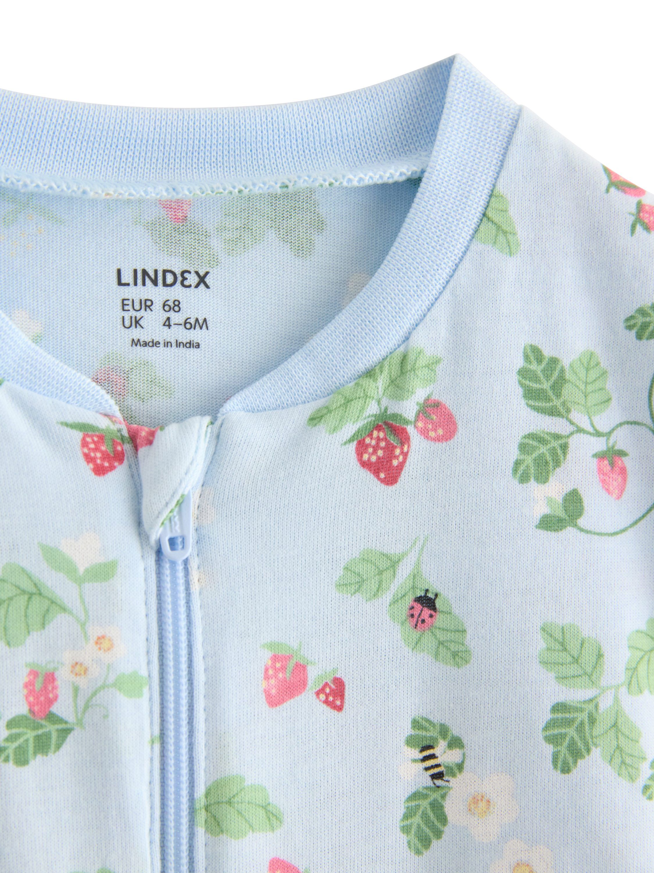 Short-sleeved pyjama romper with an