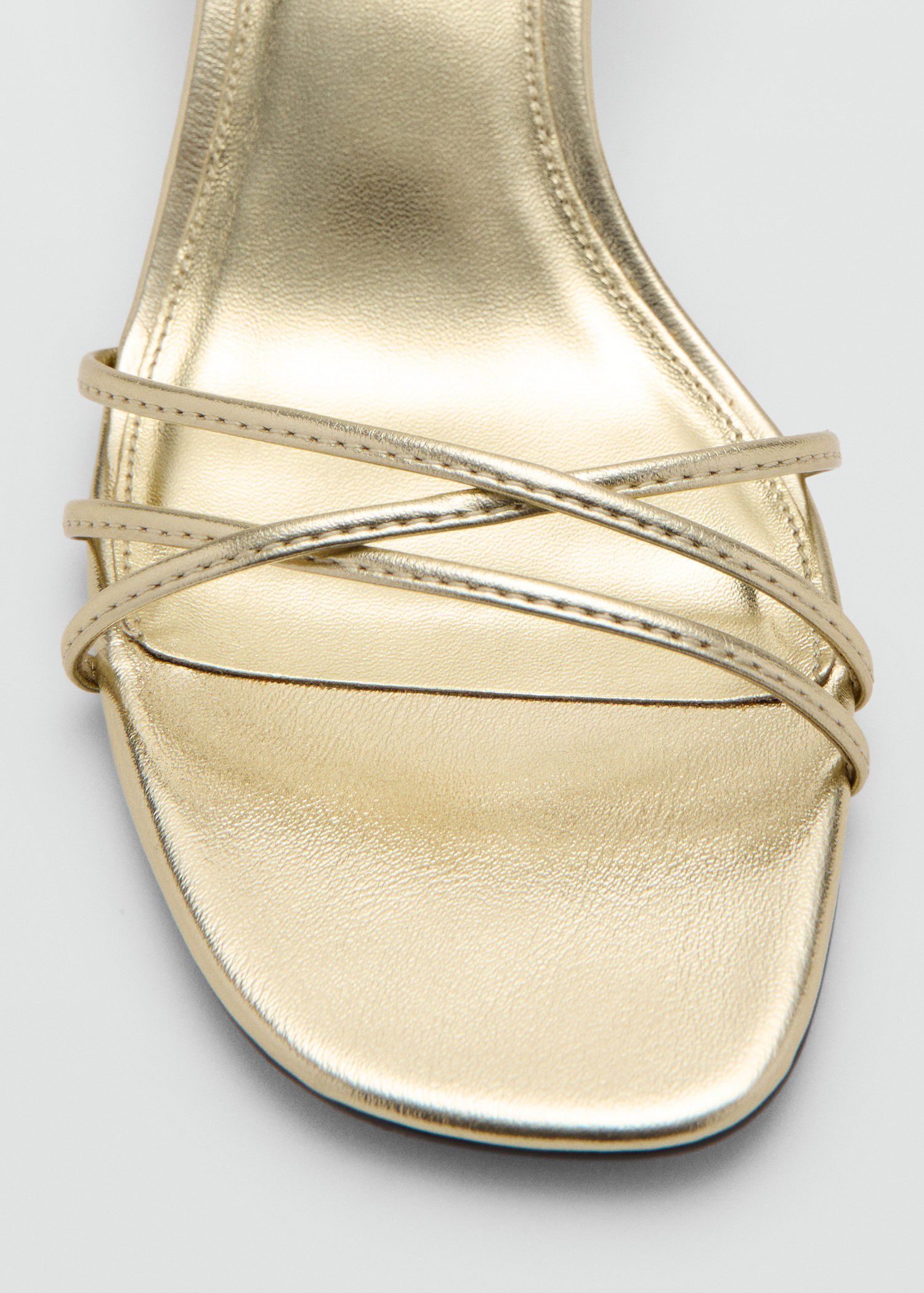 Heeled sandals with straps