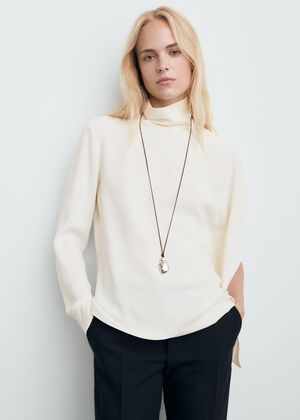 High-neck blouse with asymmetrical