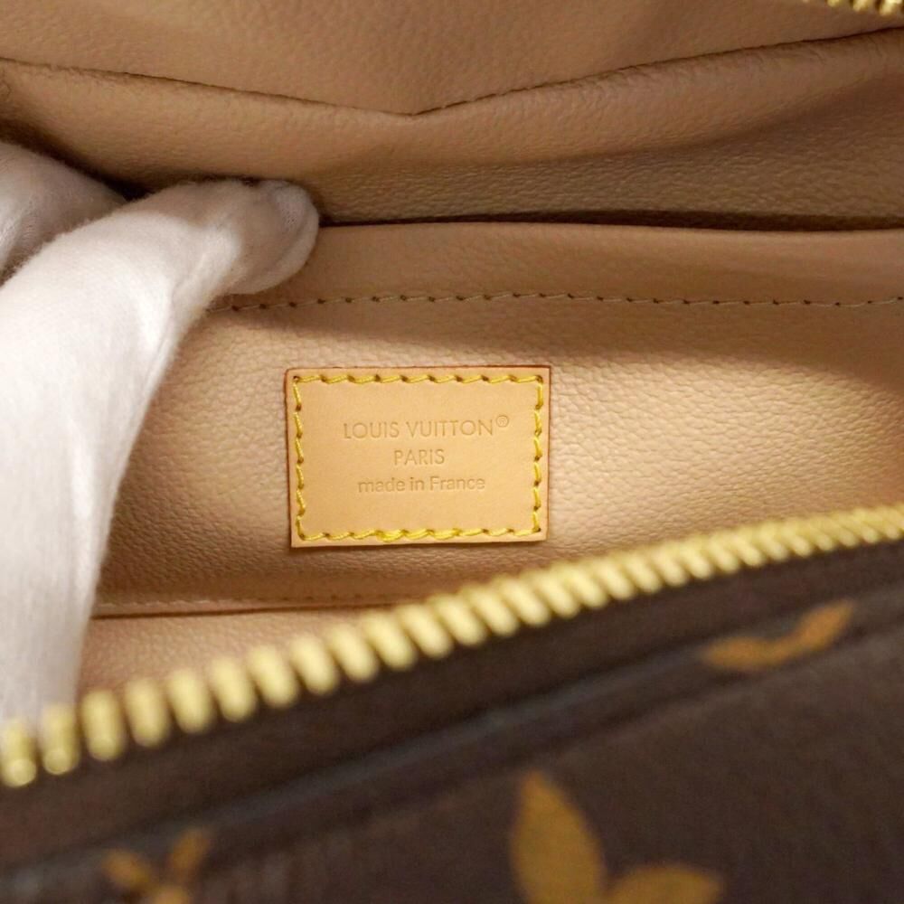 Louis Vuitton Clutch