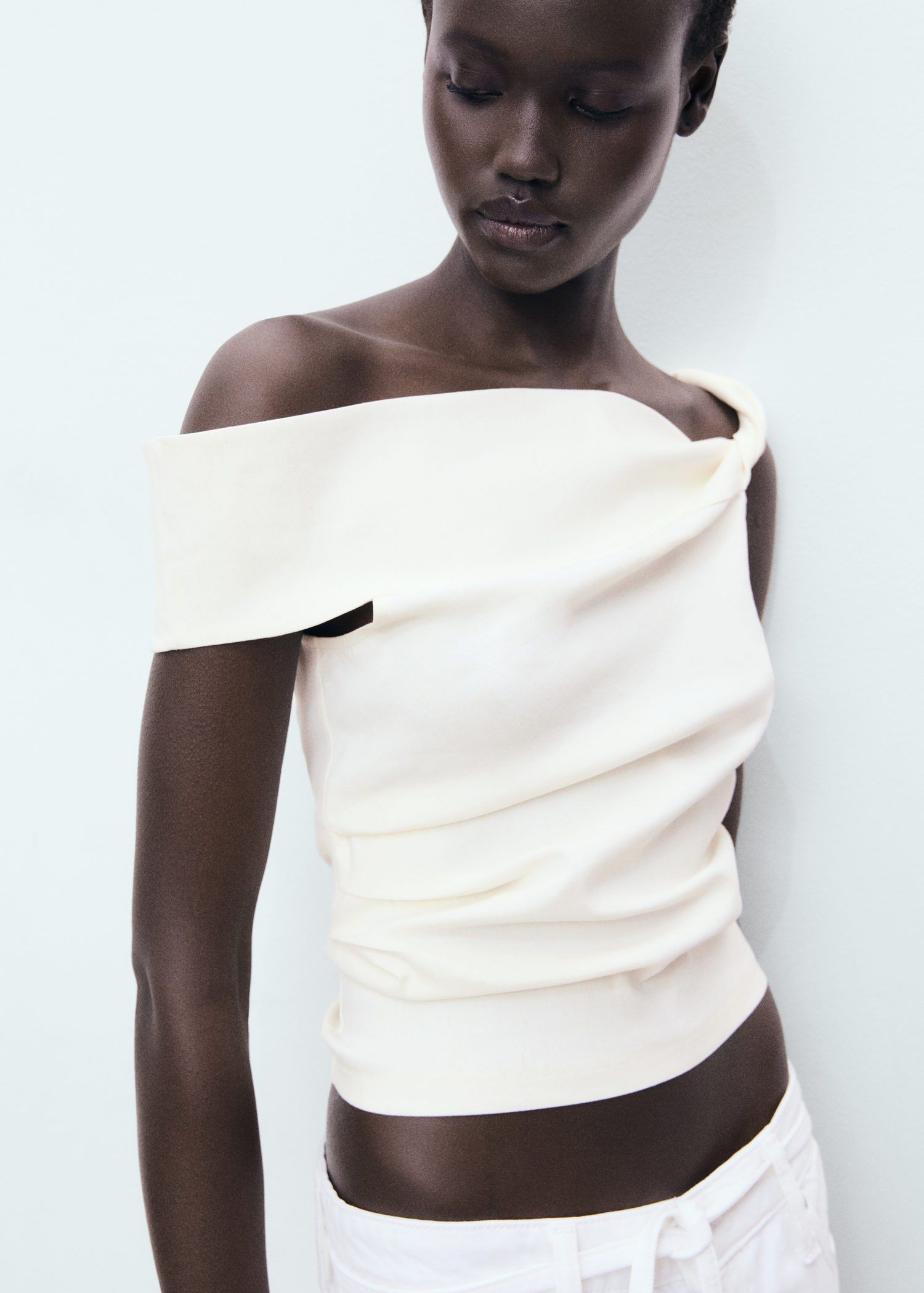 Asymmetrical strapless top