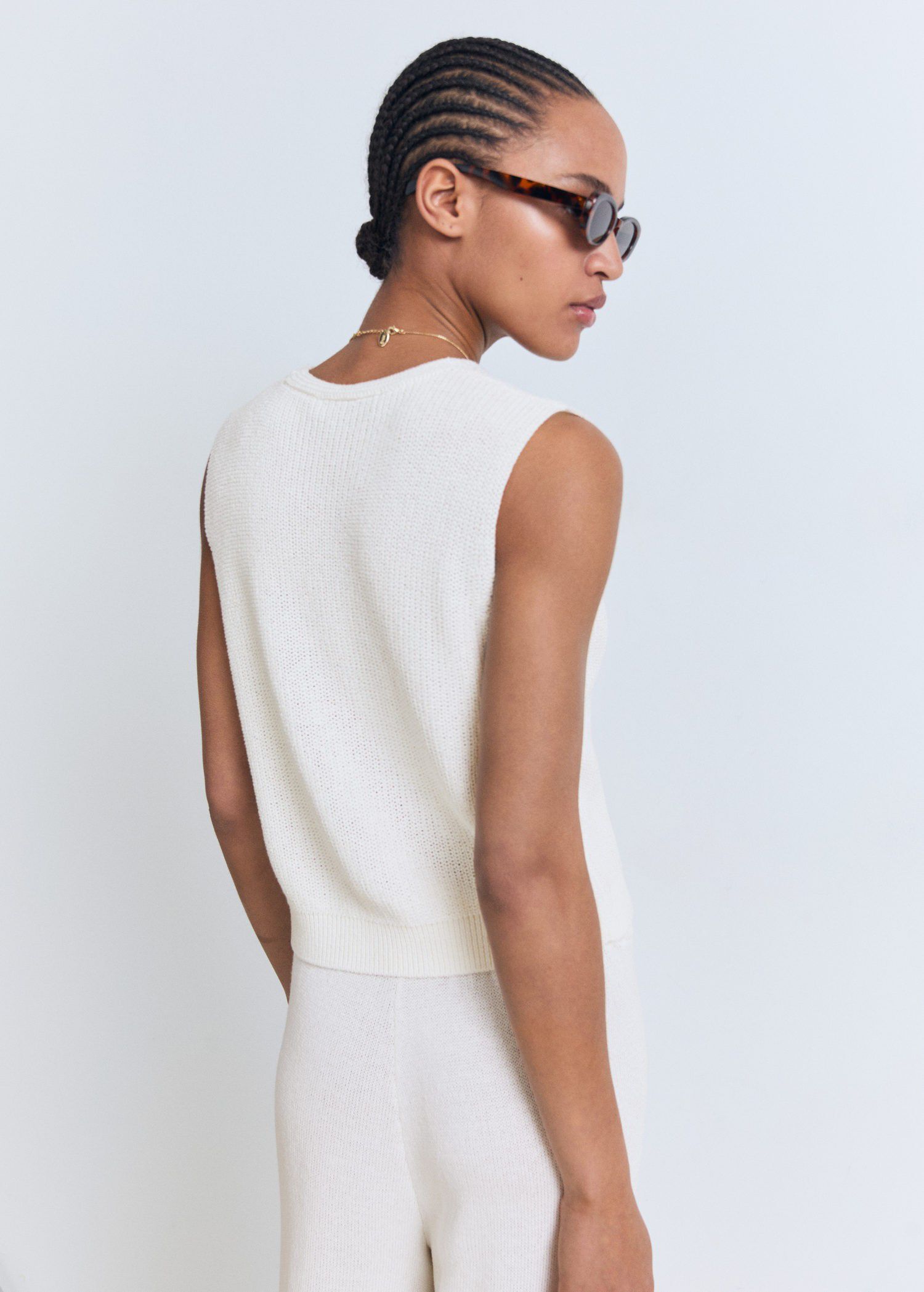 Openwork knitted waistcoat