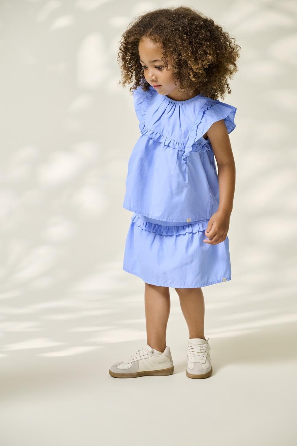 KMGCLARE RUFFLE SKORT WVN