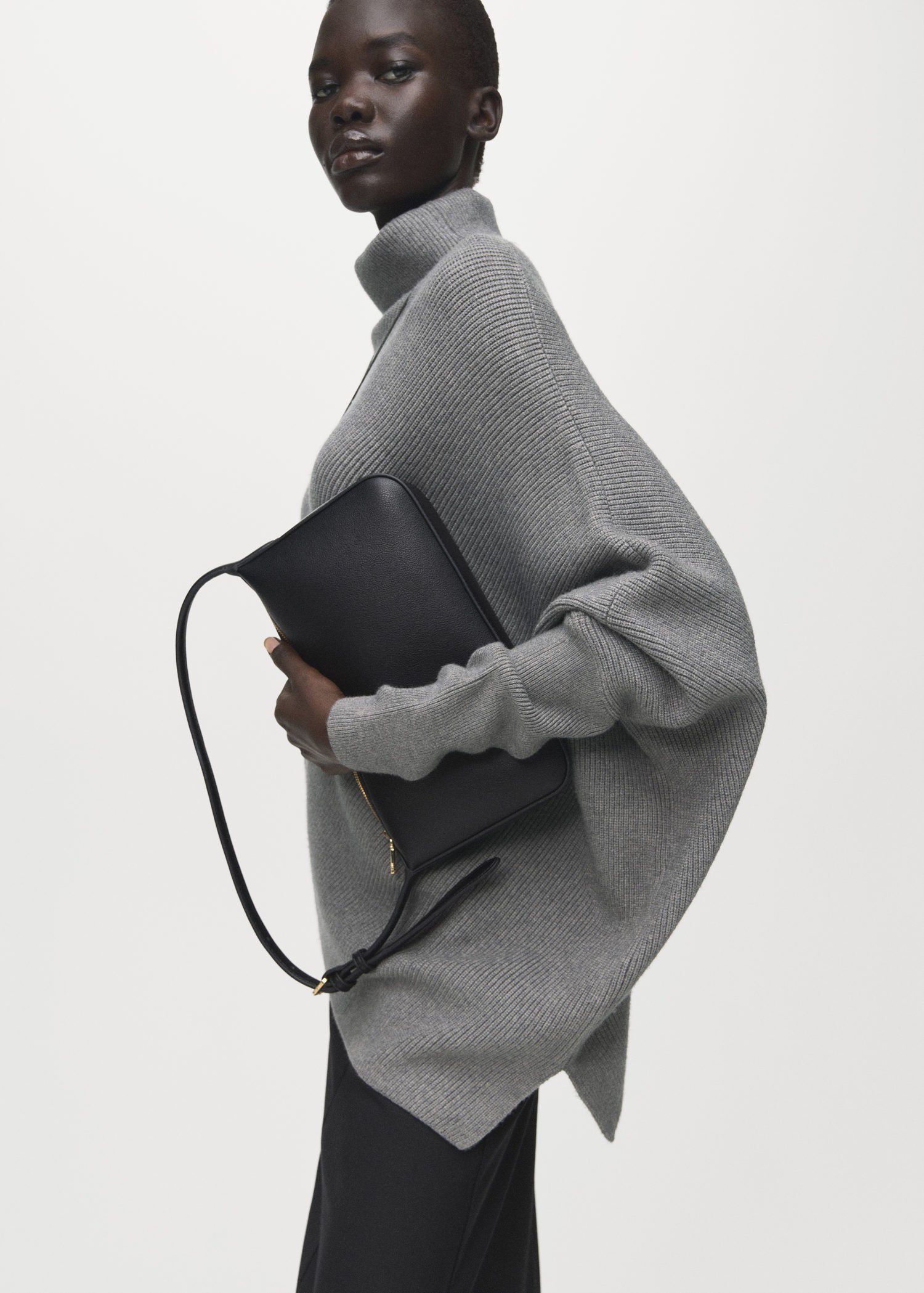 Sweater with asymmetrical roll neck