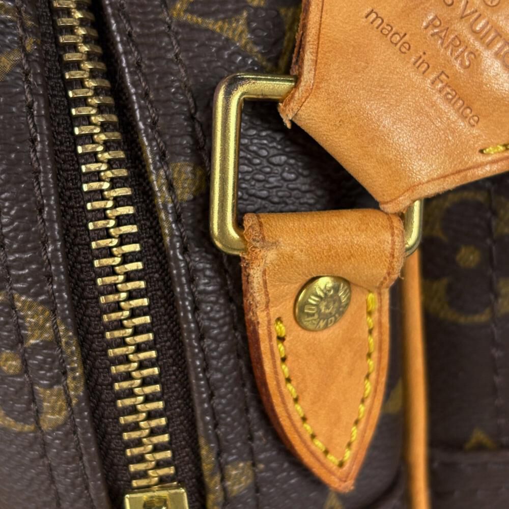 Louis Vuitton Reporter
