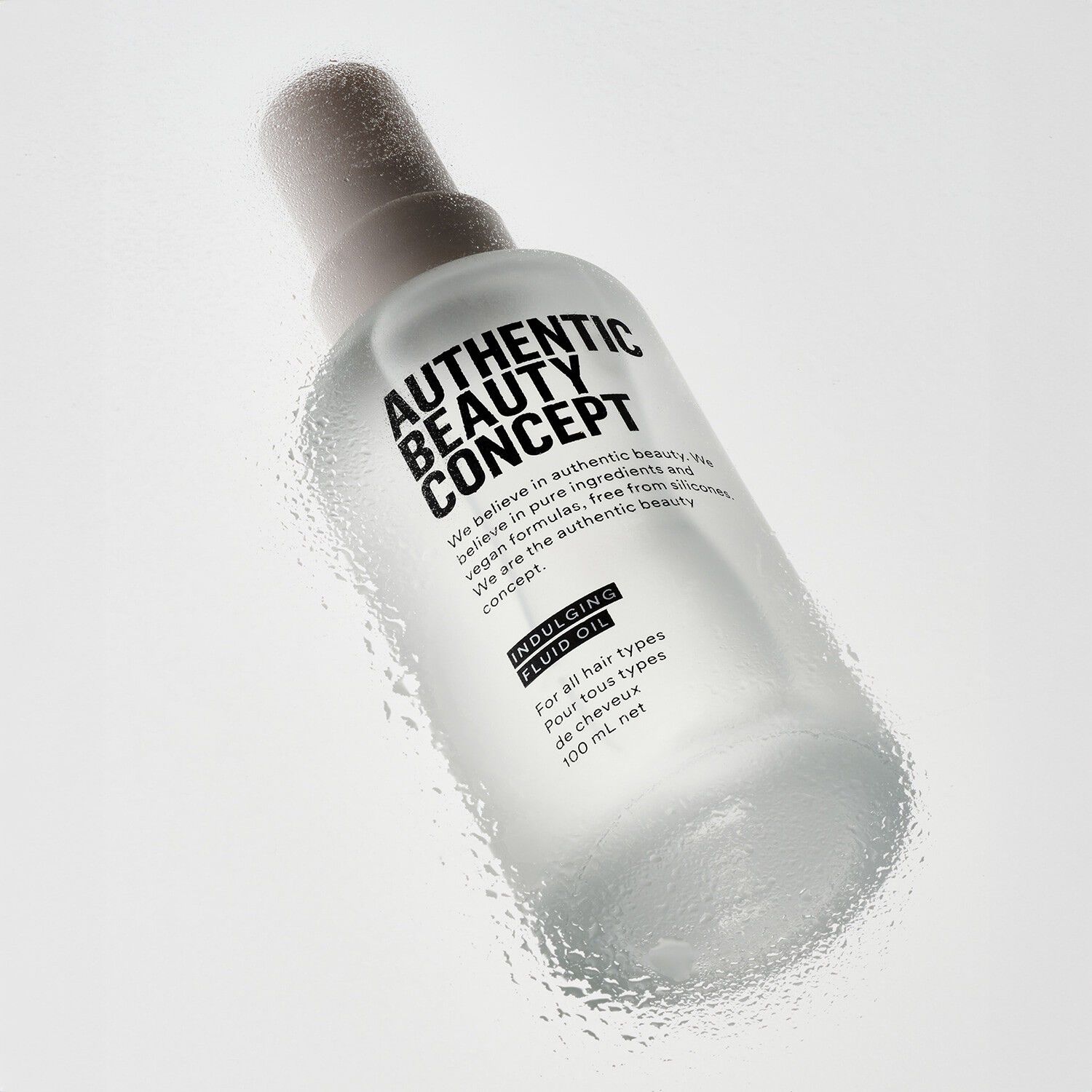 Indulging Fluid Oil - Let udglattende olie til skinnende h&aring;r