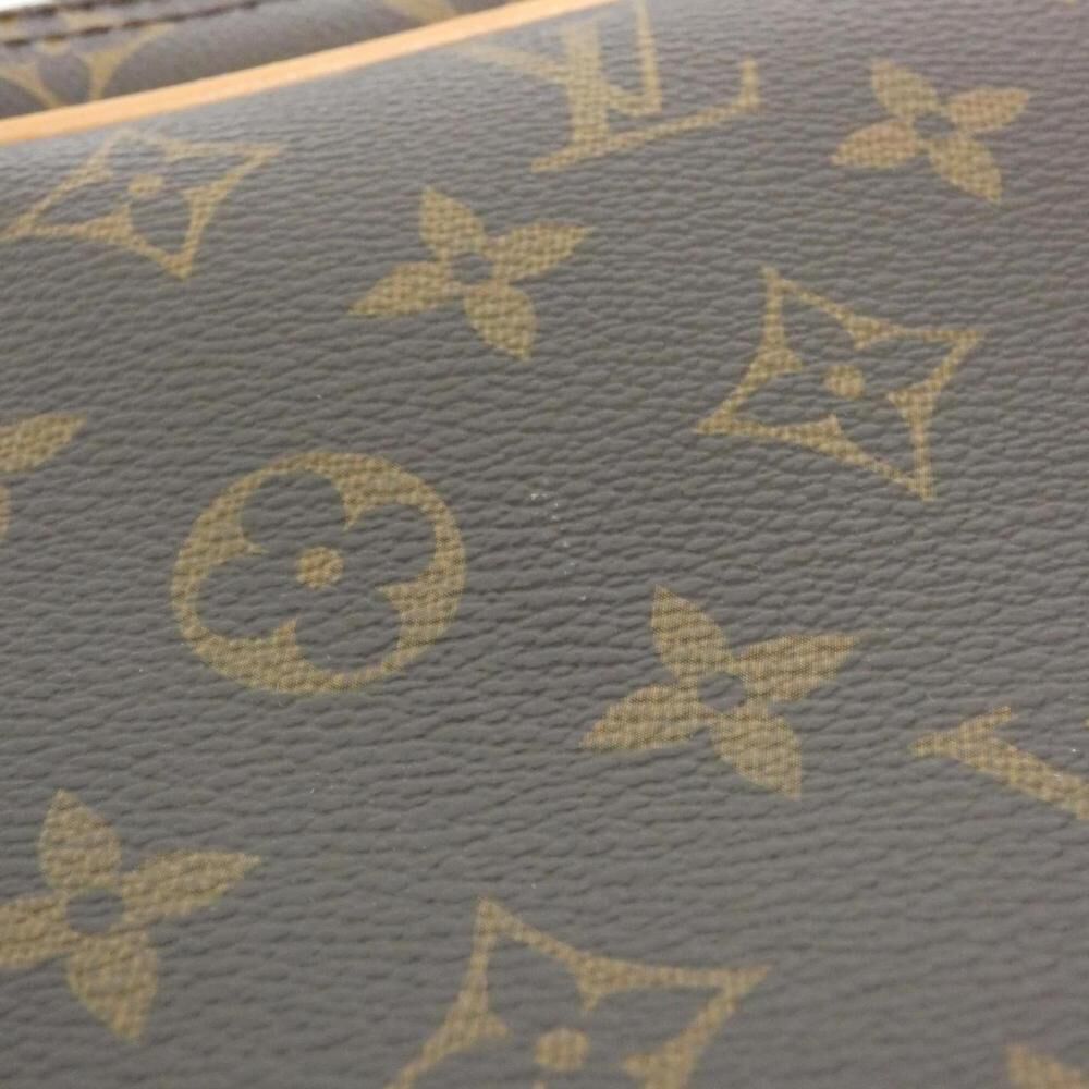 Louis Vuitton Reporter