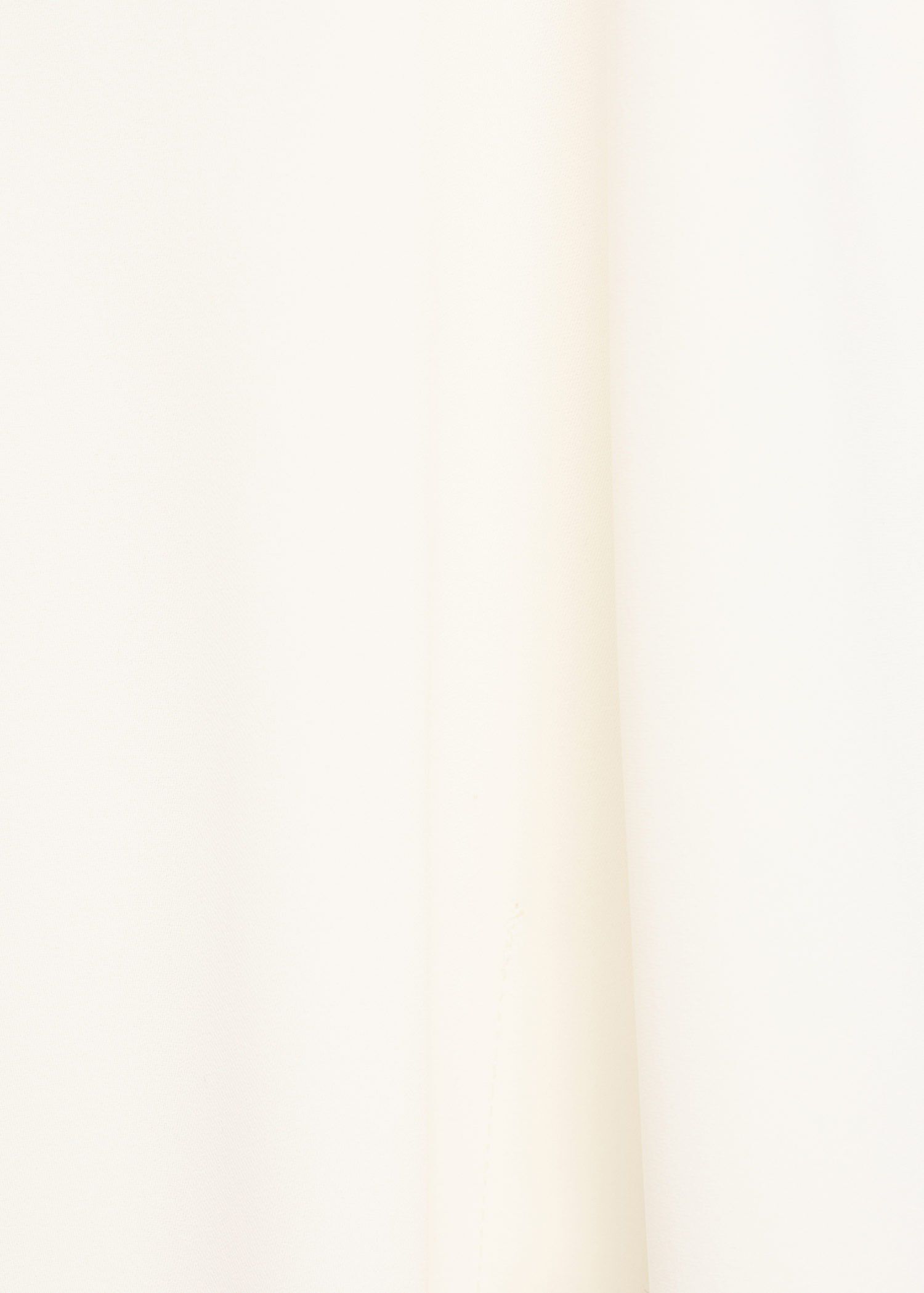 High-neck blouse with asymmetrical