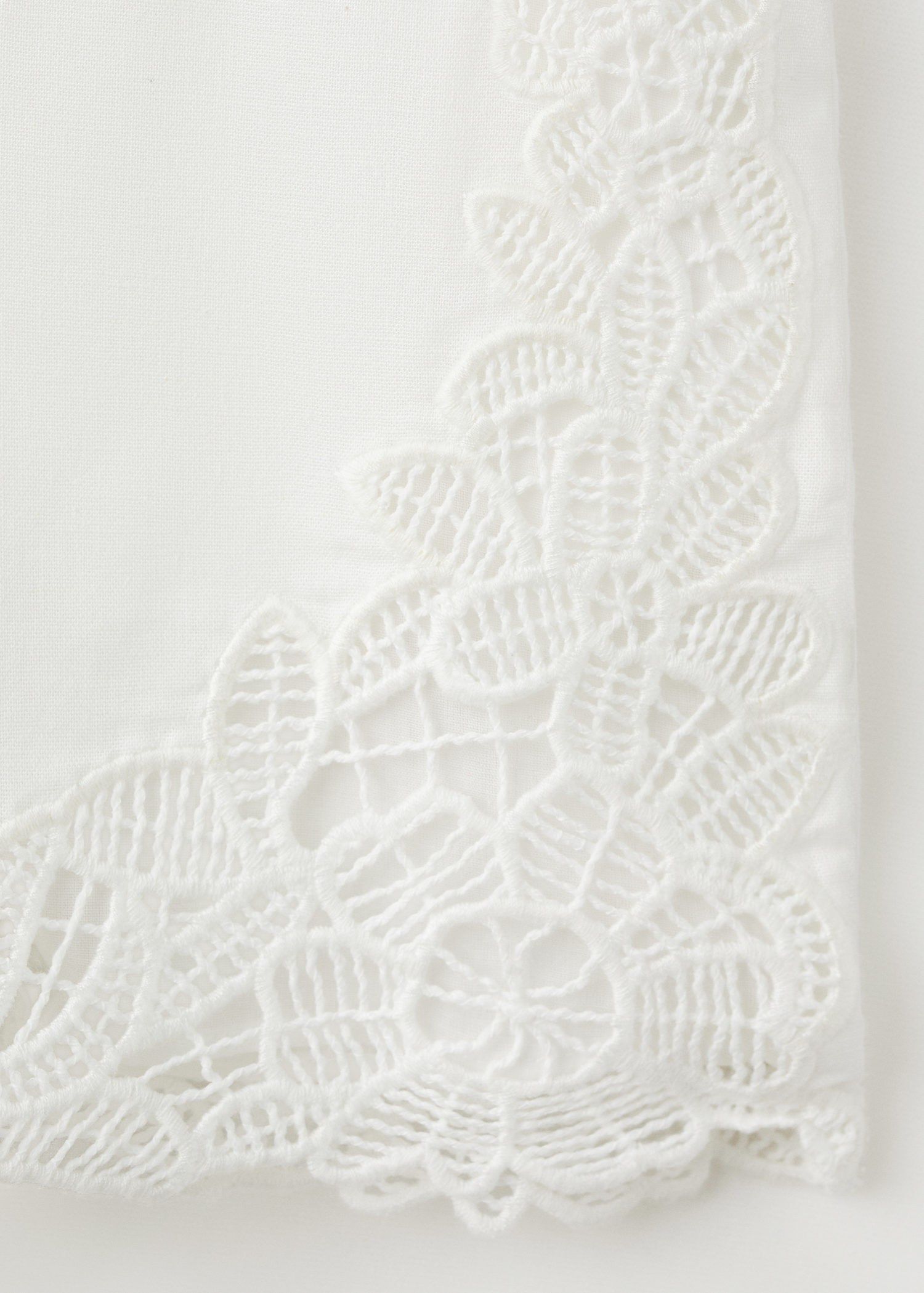 Embroidered openwork shorts