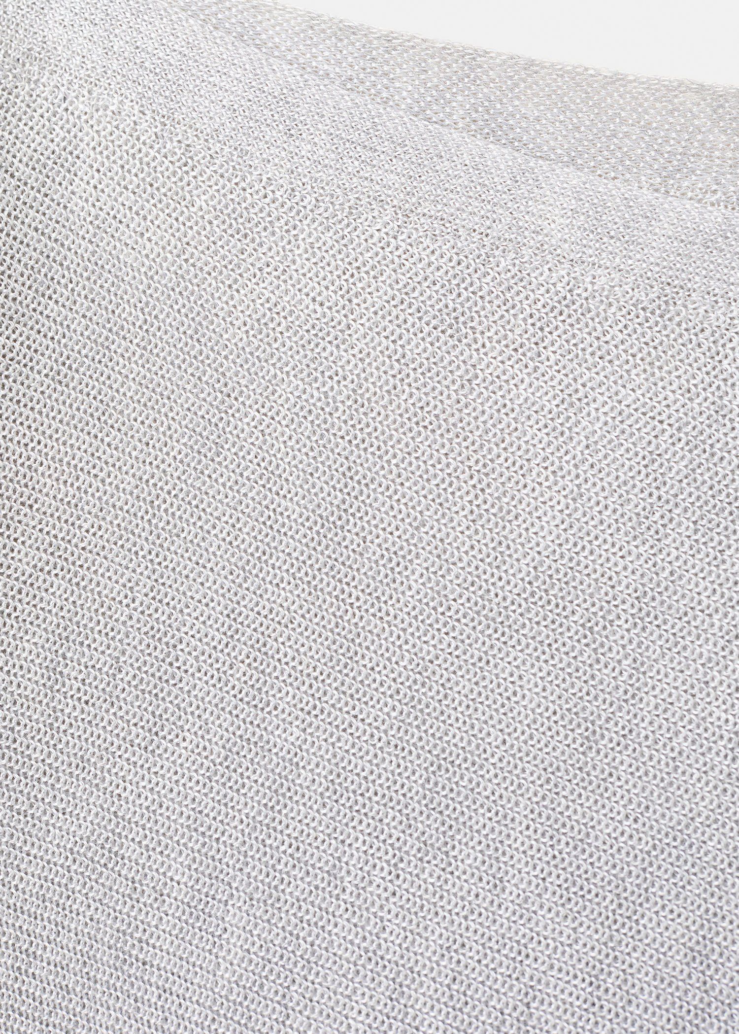 Asymmetrical knitted cape