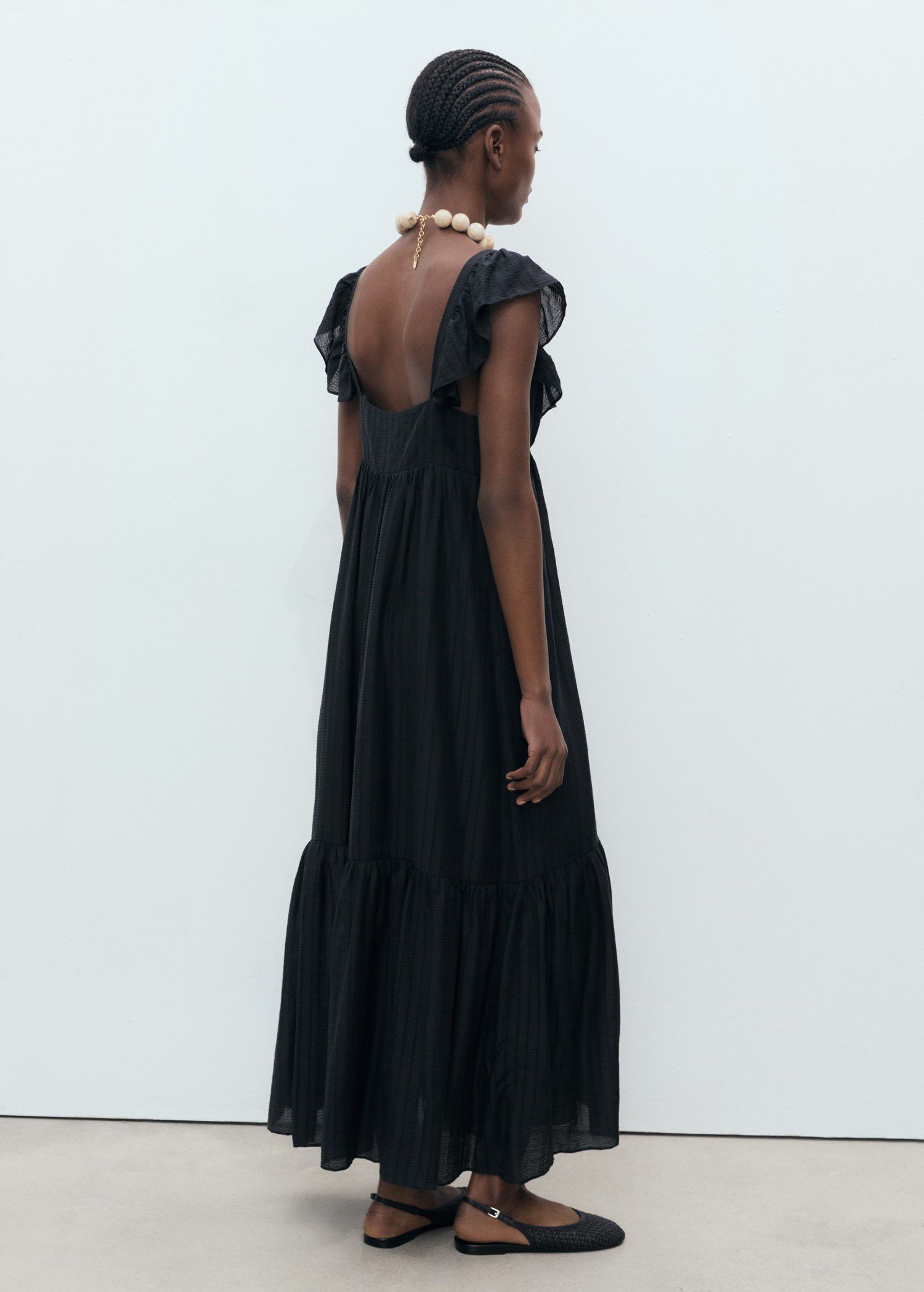 Long dress with ruffle neckline
