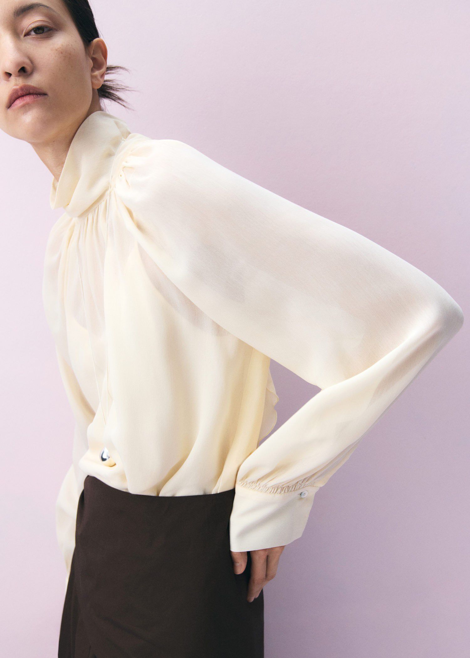 Turtleneck ruffled blouse