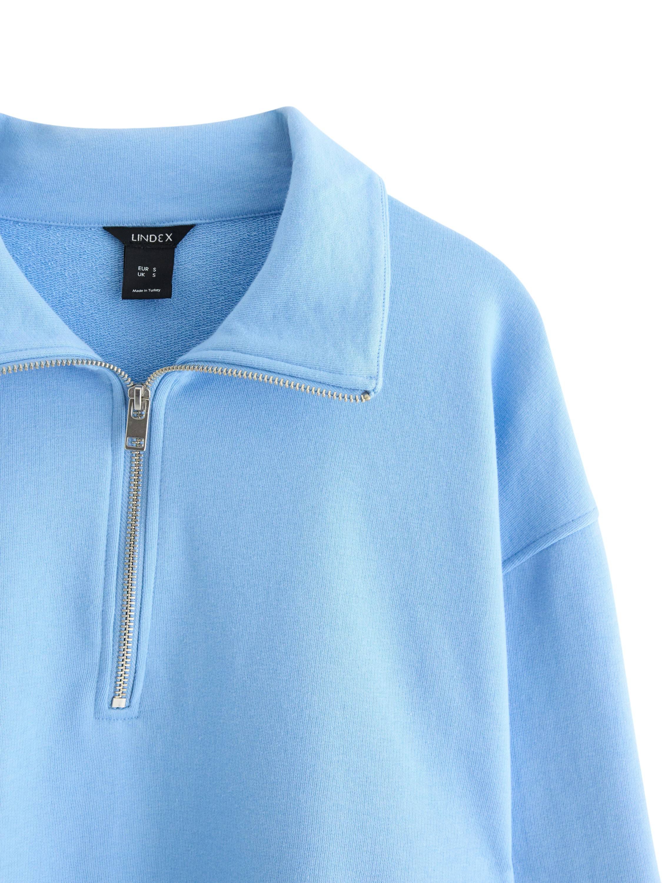 Mjuk sweatshirt med half zip och av