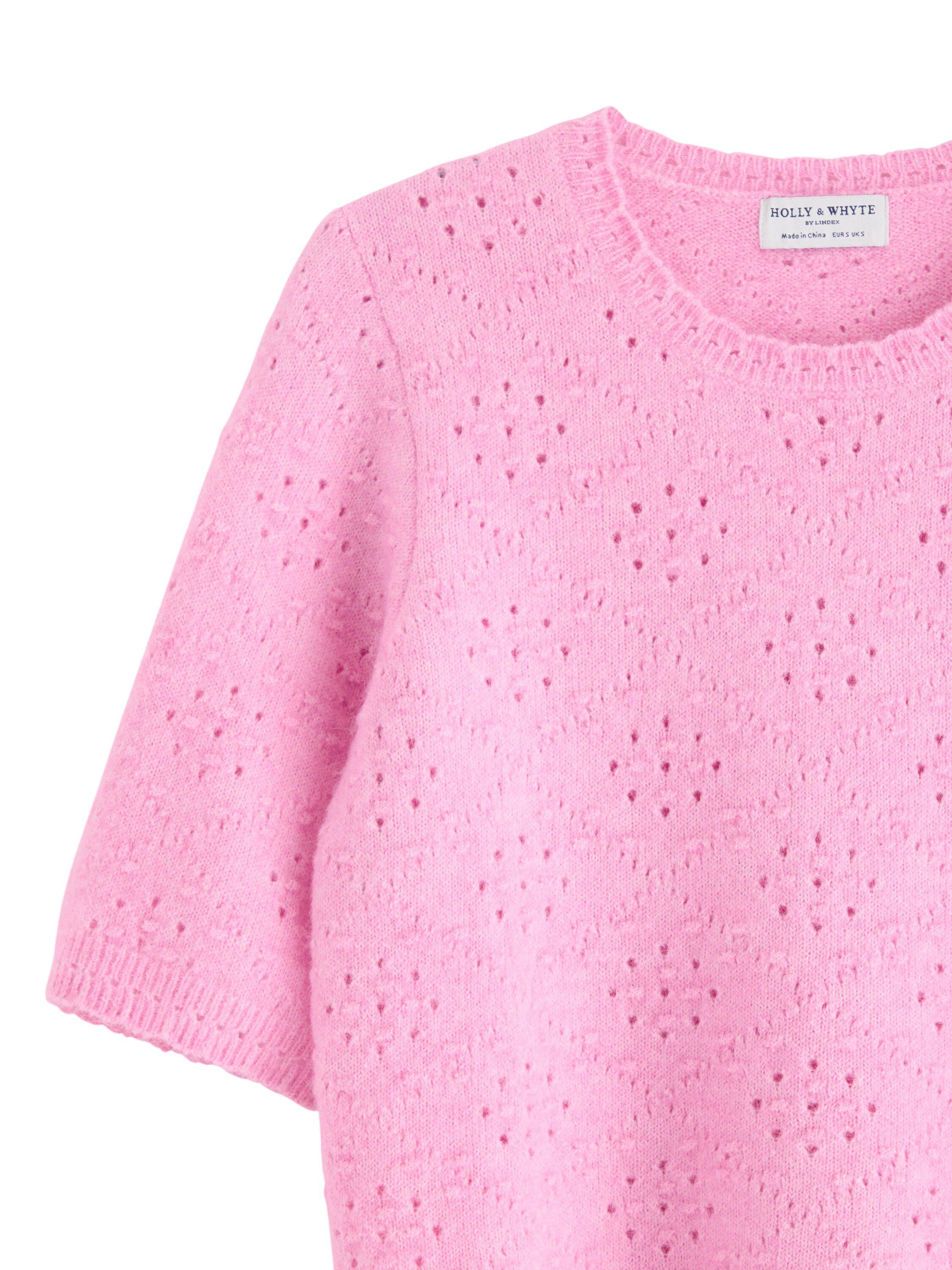 Bl&oslash;d, kort&aelig;rmet tr&oslash;je med et hel