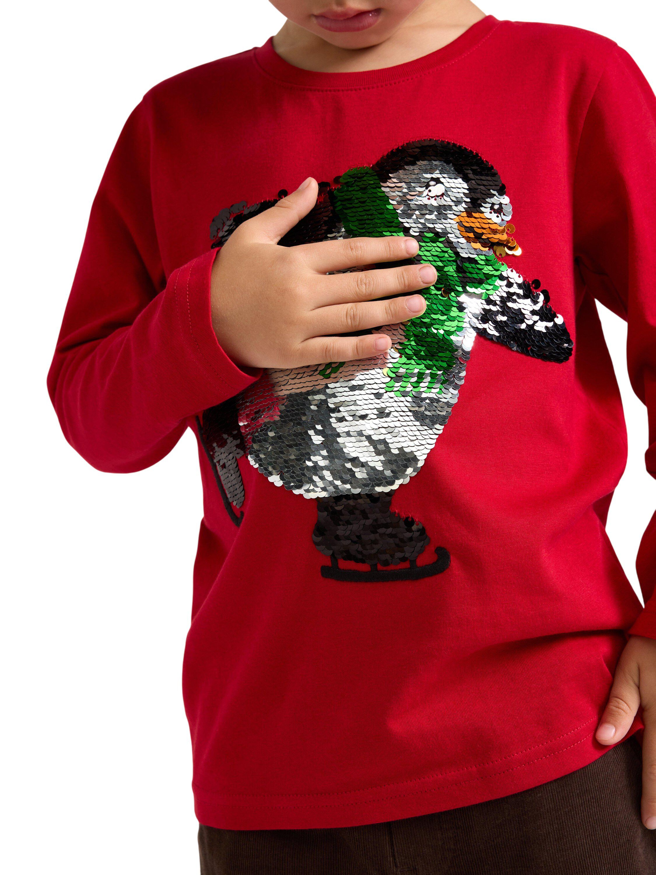 Long-sleeved jersey top with a reve