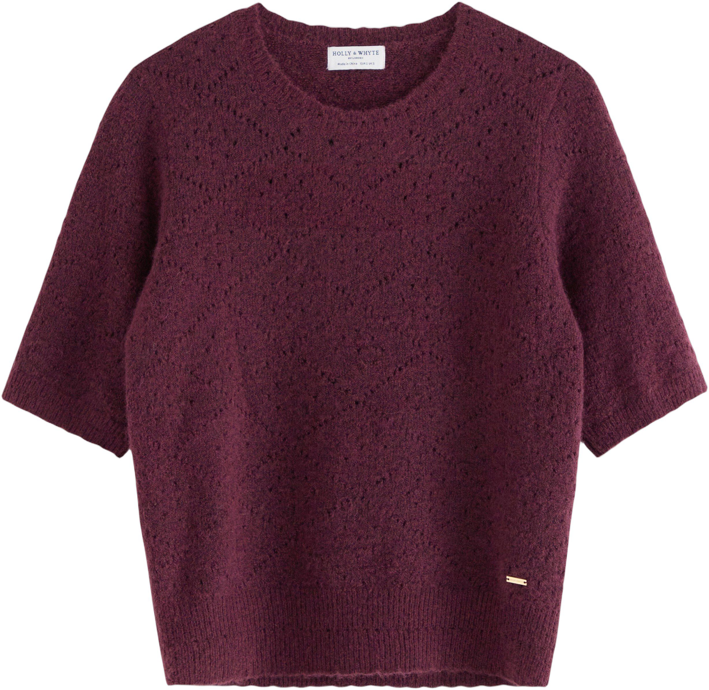 Mjuk, kort&auml;rmad tr&ouml;ja med ett hel