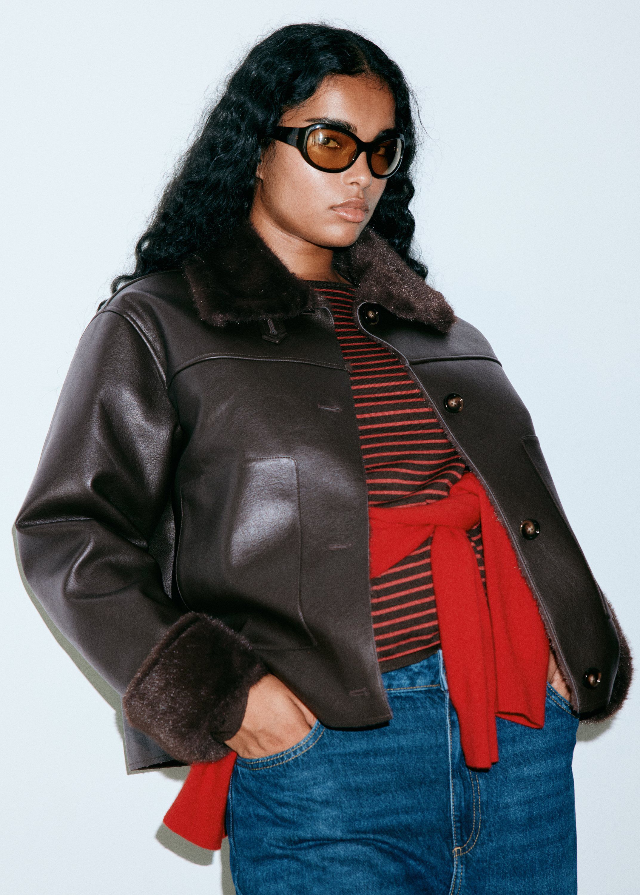 Faux leather jacket with fur trim