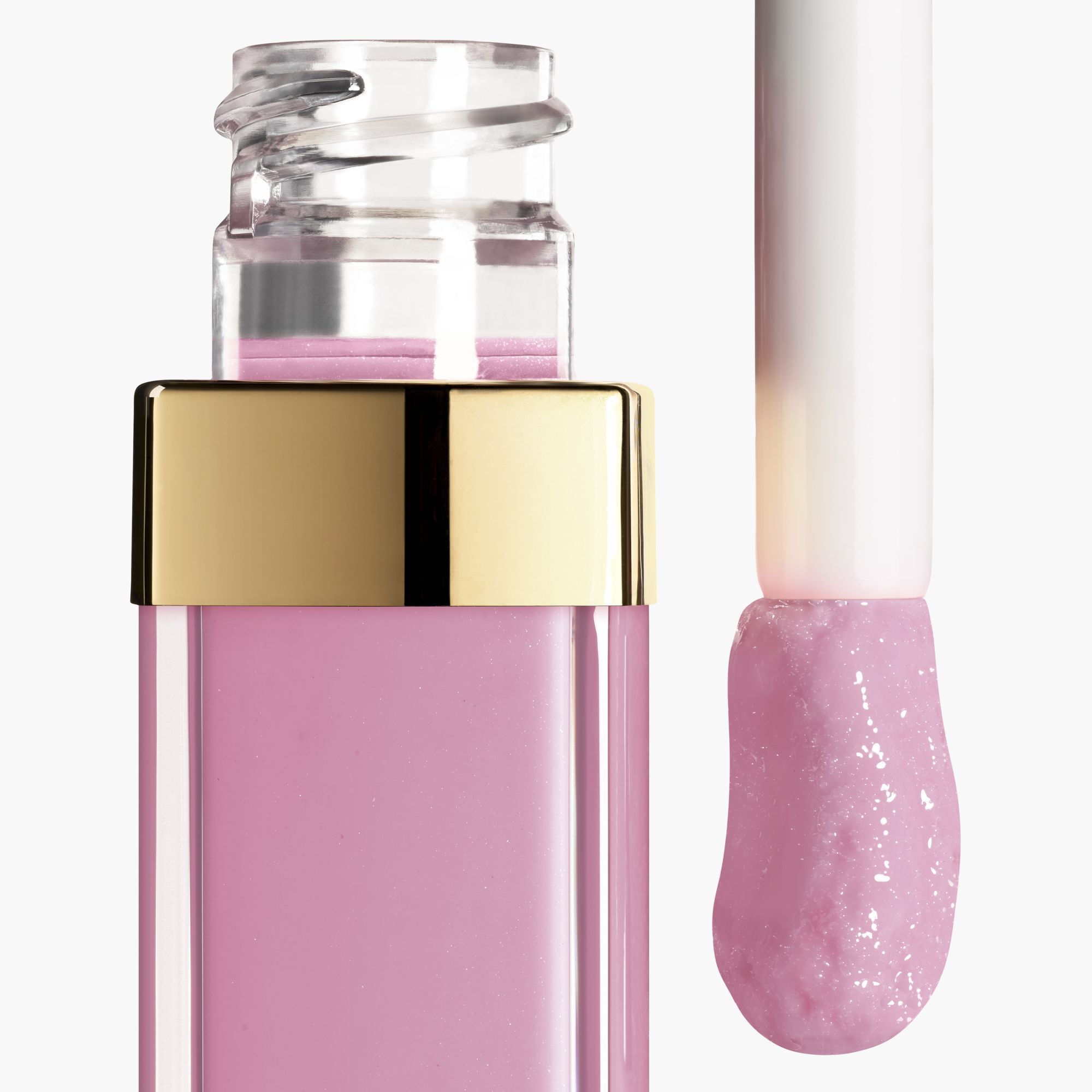 FUGTGIVENDE OG UDGLATTENDE LIPGLOSS MED H&Oslash;J GLANS