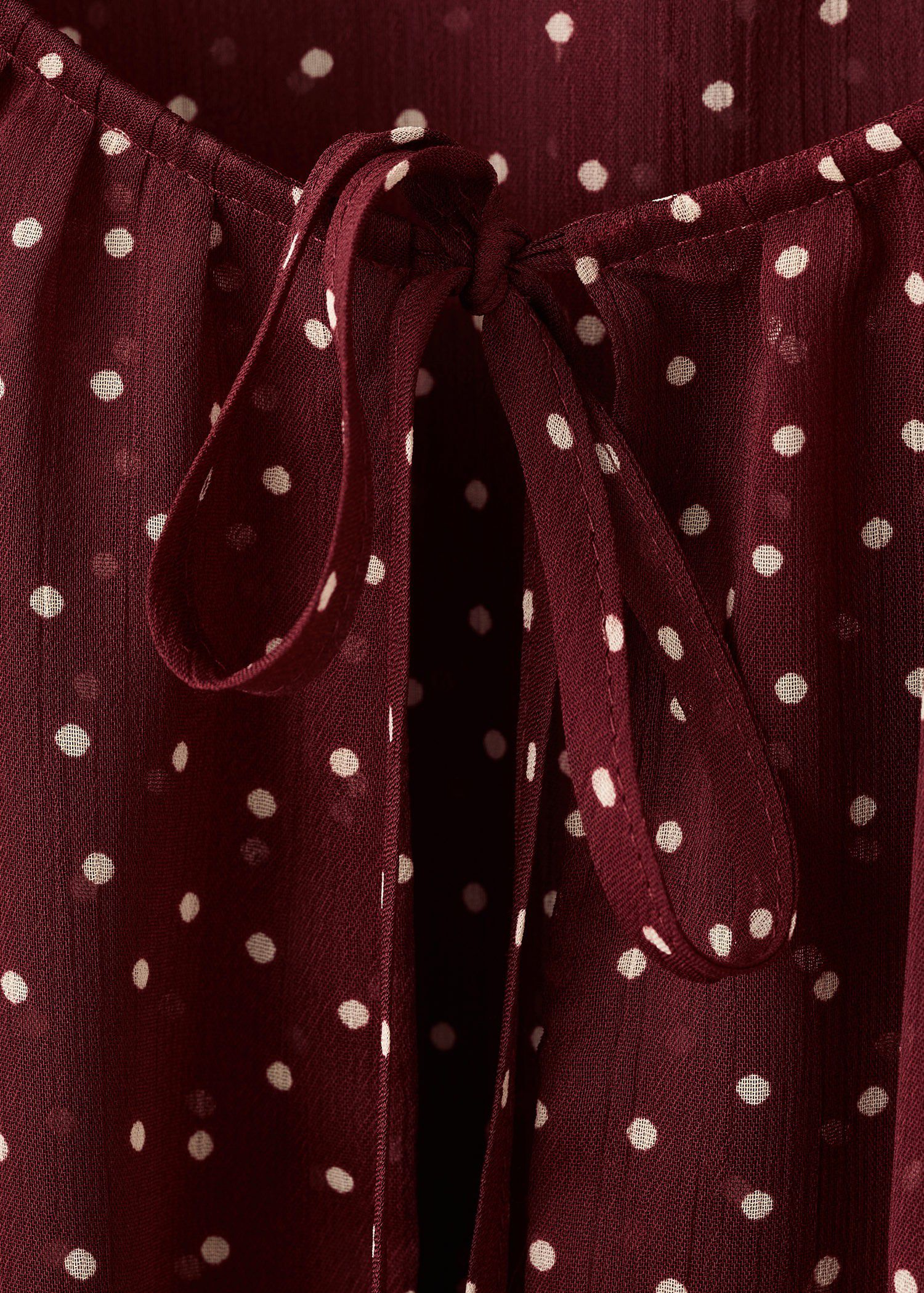 Bow polka-dot blouse