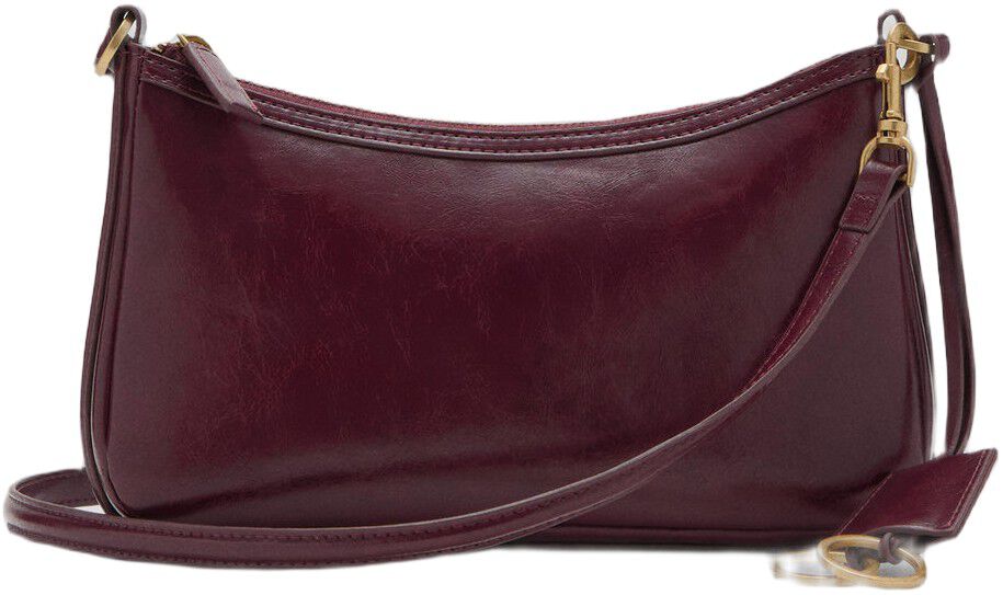 Crossbody bag with charms and rings