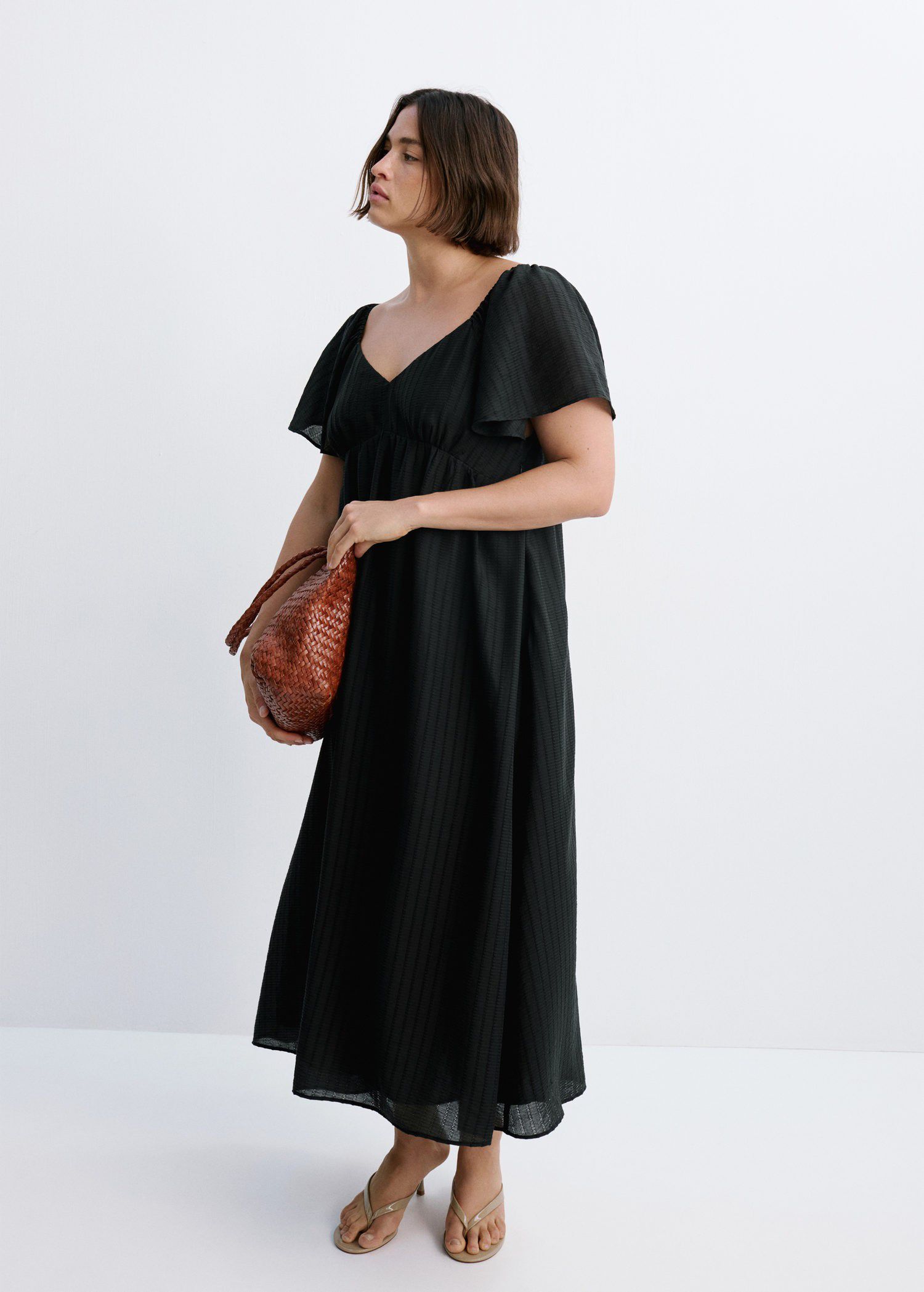 Textured dress with ruched detail