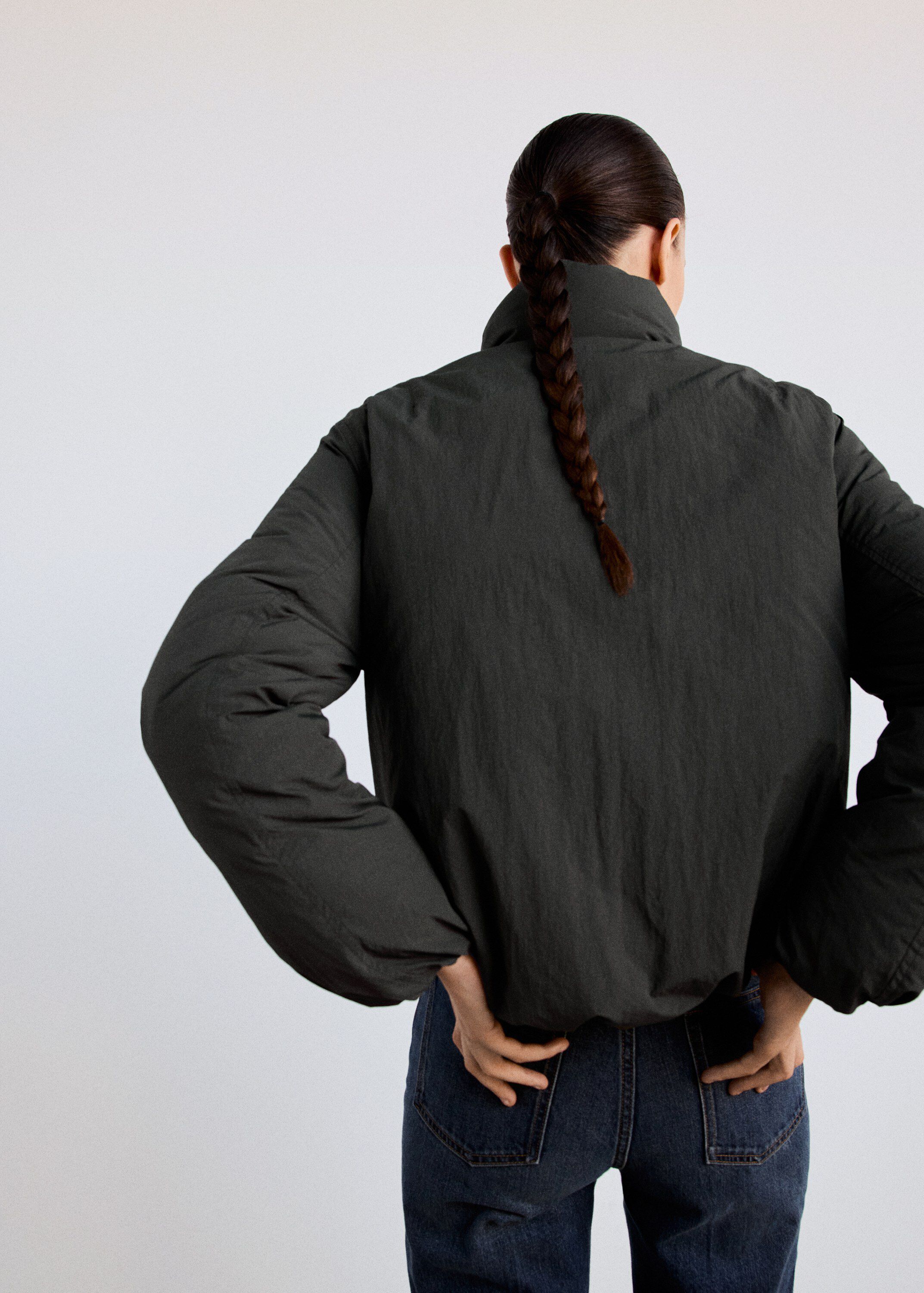 Padded anorak with toggle fastening