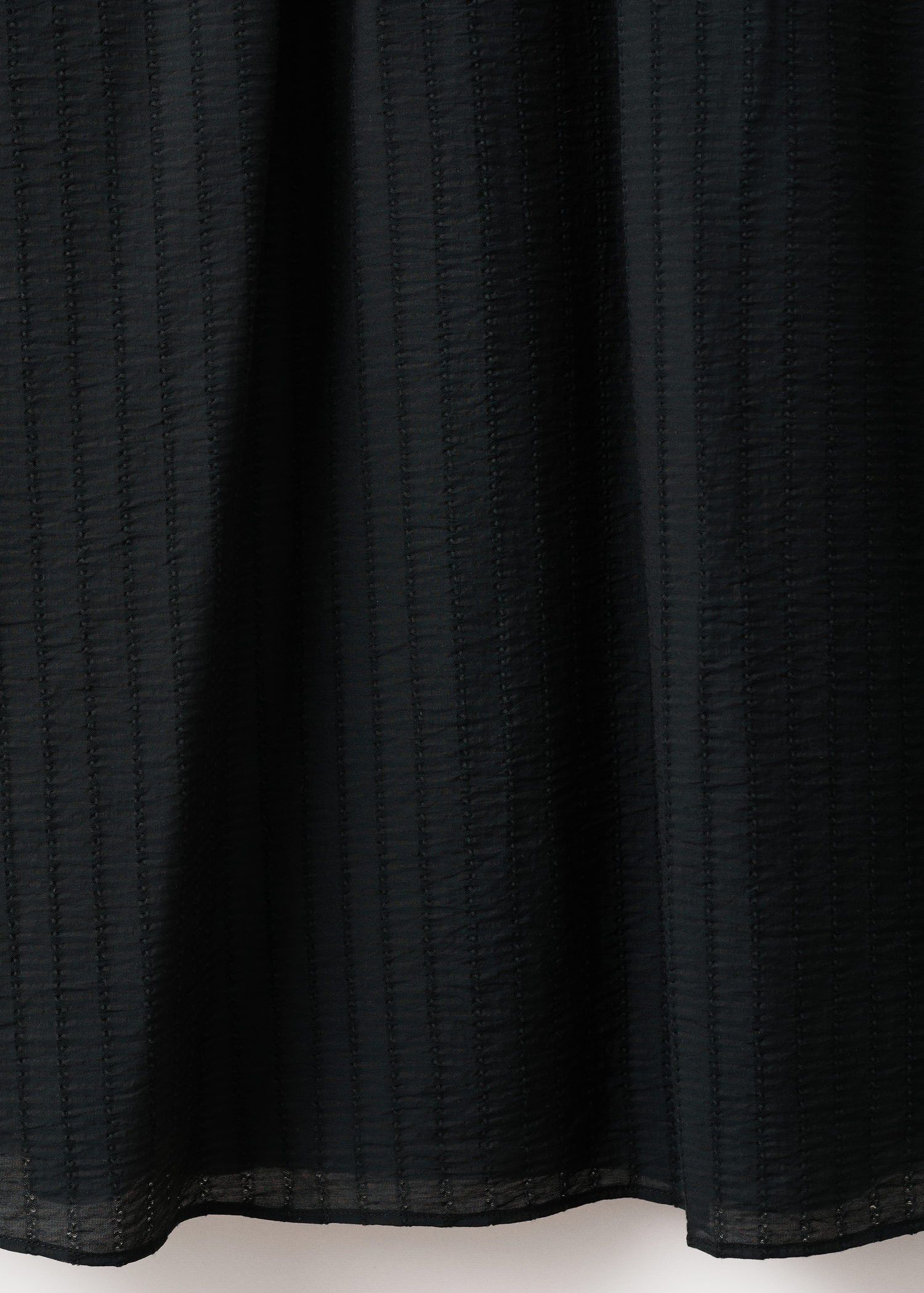 Textured dress with ruched detail