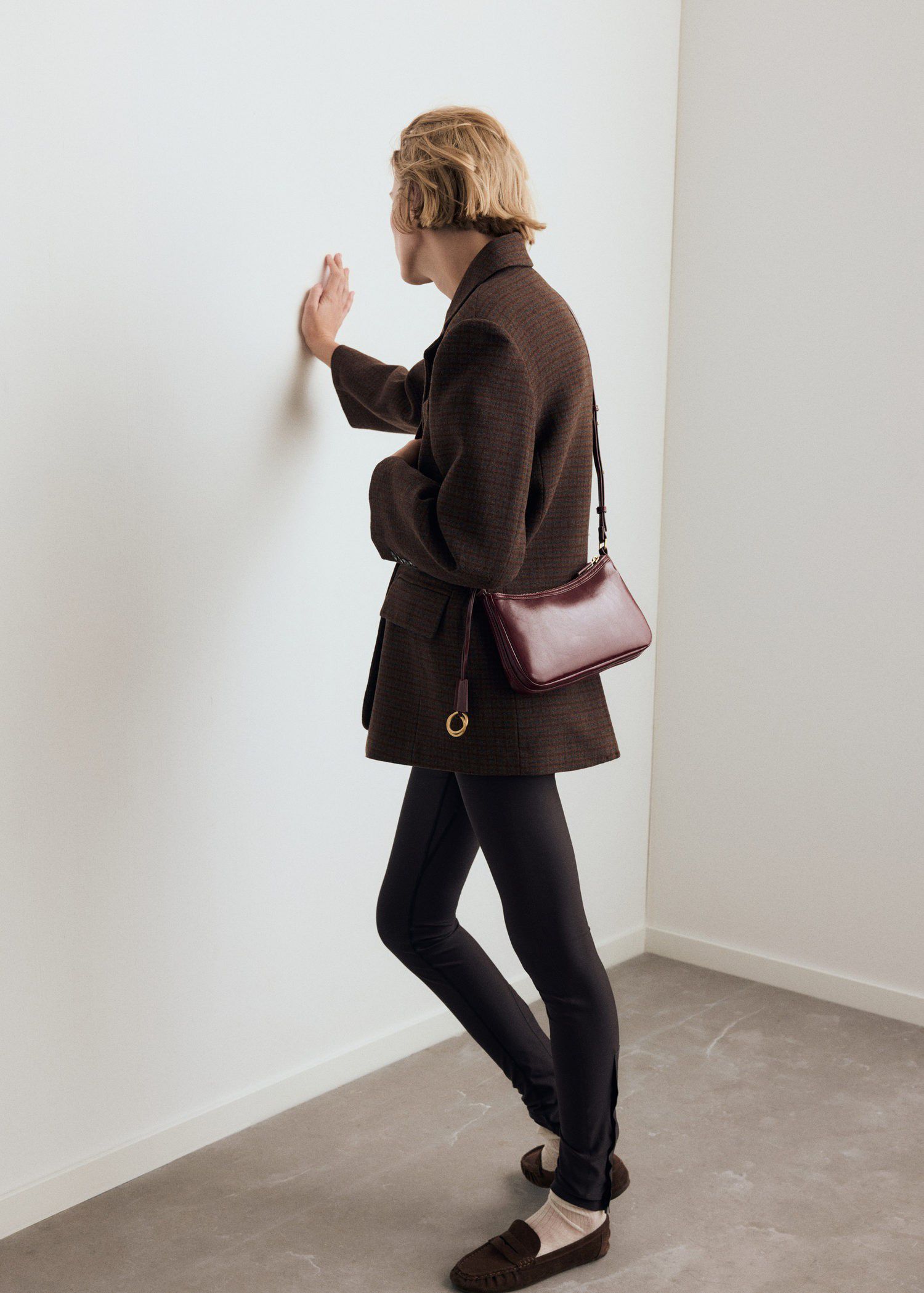 Crossbody bag with charms and rings
