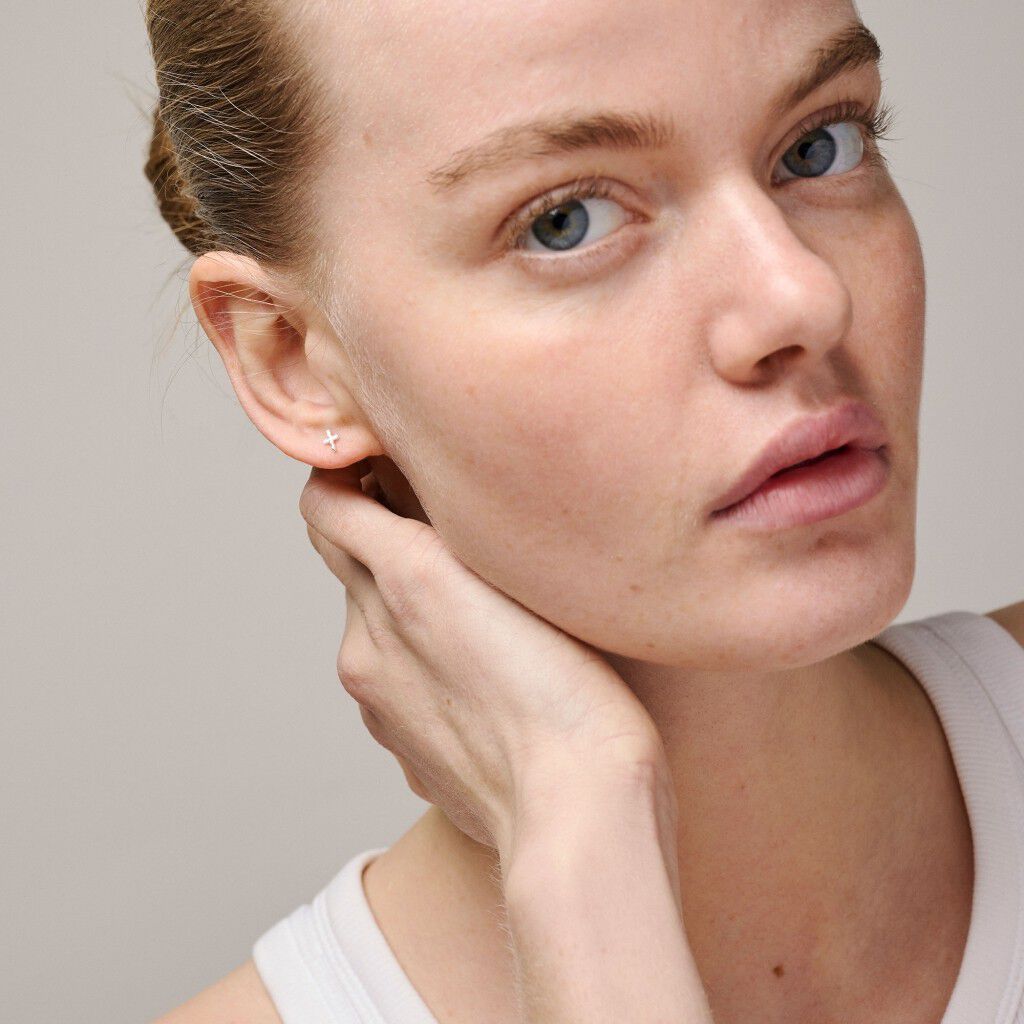 Studs, Protective Cross