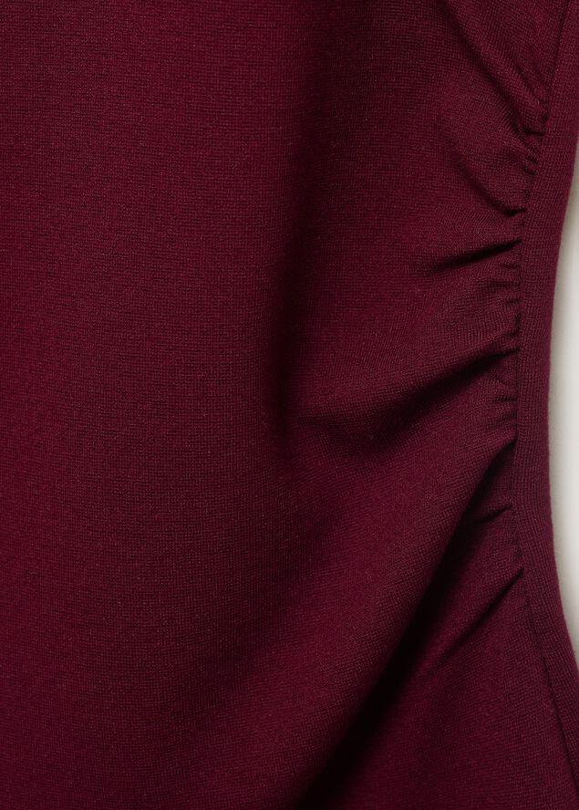 Asymmetrical draped top